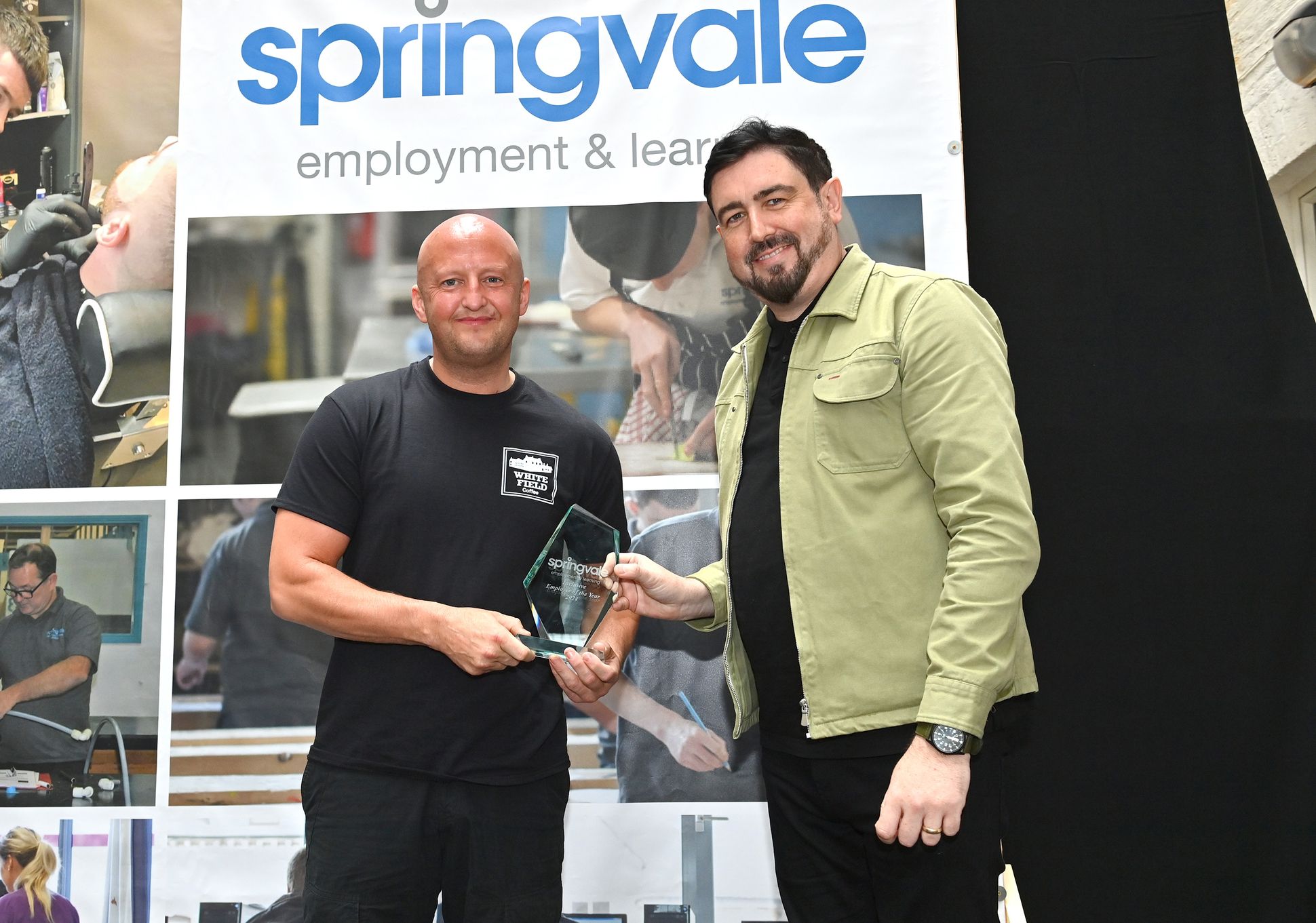 Ciaran McLaughlin from Whitefield Coffee is presented with the Inclusion Employer of the Year award by Councillor Paul Doherty