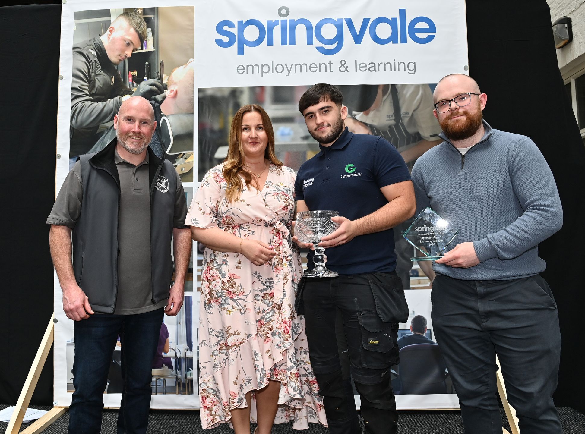 Luke McErlean (Apprenticeships NI Learner of the Year) is presented with his award by his tutor Raymond McKenna and his employer Greenview