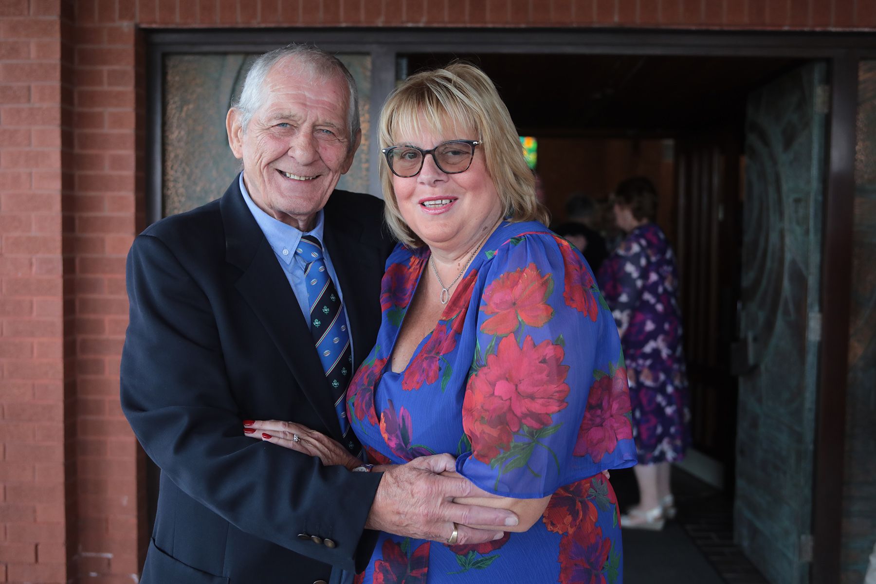 END OF AN ERA: Bronagh Farrimond and her husband Jim outside the Holy Spirit Church on the Glen Road