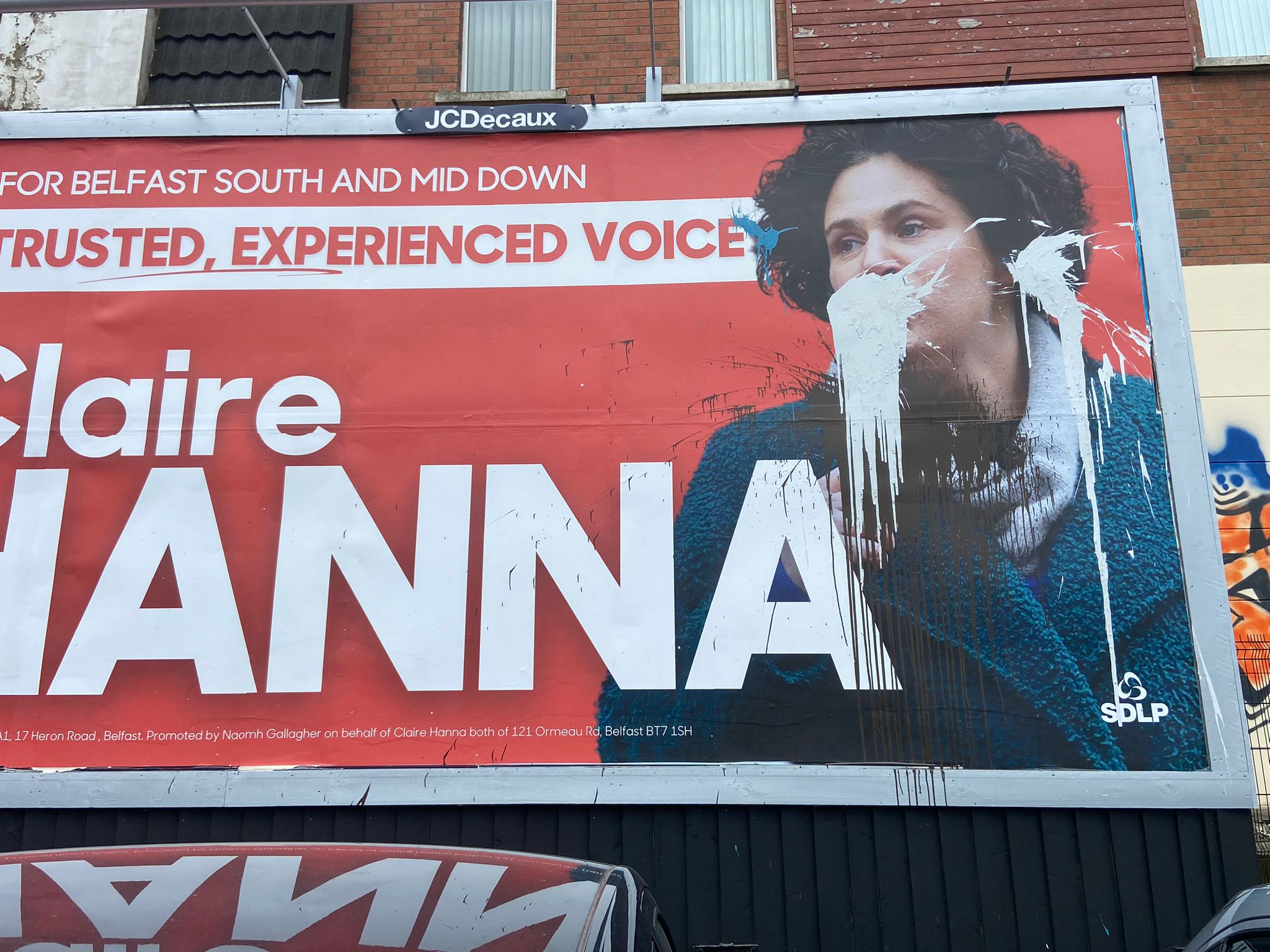 ATTACKED: Claire Hanna\'s billboard has been paint-bombed