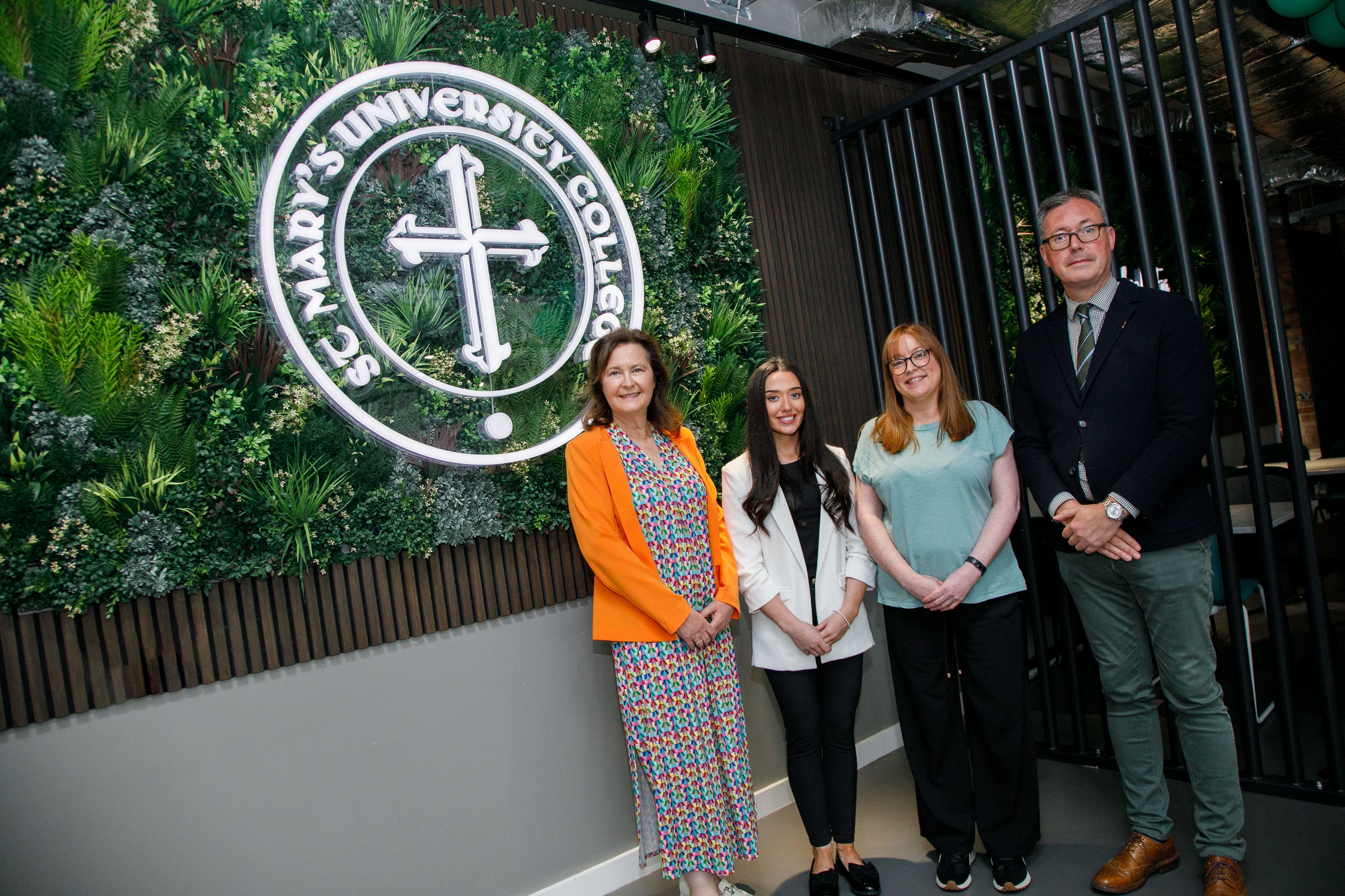 COMHGHAIRDEAS: Congratulating Fulbright Irish Awardees Caragh and Róisín are Gabrielle Nig Uidhir, Head of Irish Medium, and John Brolly, Marketing and Communications Manager, St Mary’s University College