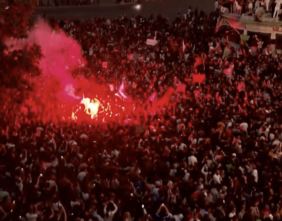 WORRYING: Crowds took to the streets in Paris to celebrate the victory of the right in the first round of voting