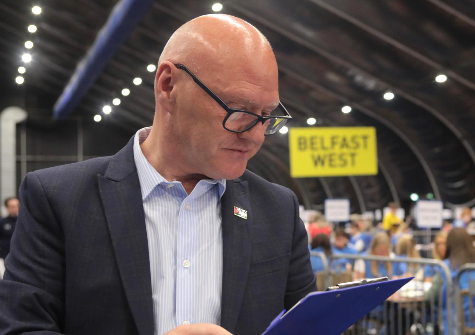 CHECKING THE TALLIES: Paul Maskey at the Titanic Exhibition Centre in the early hours of Friday morning