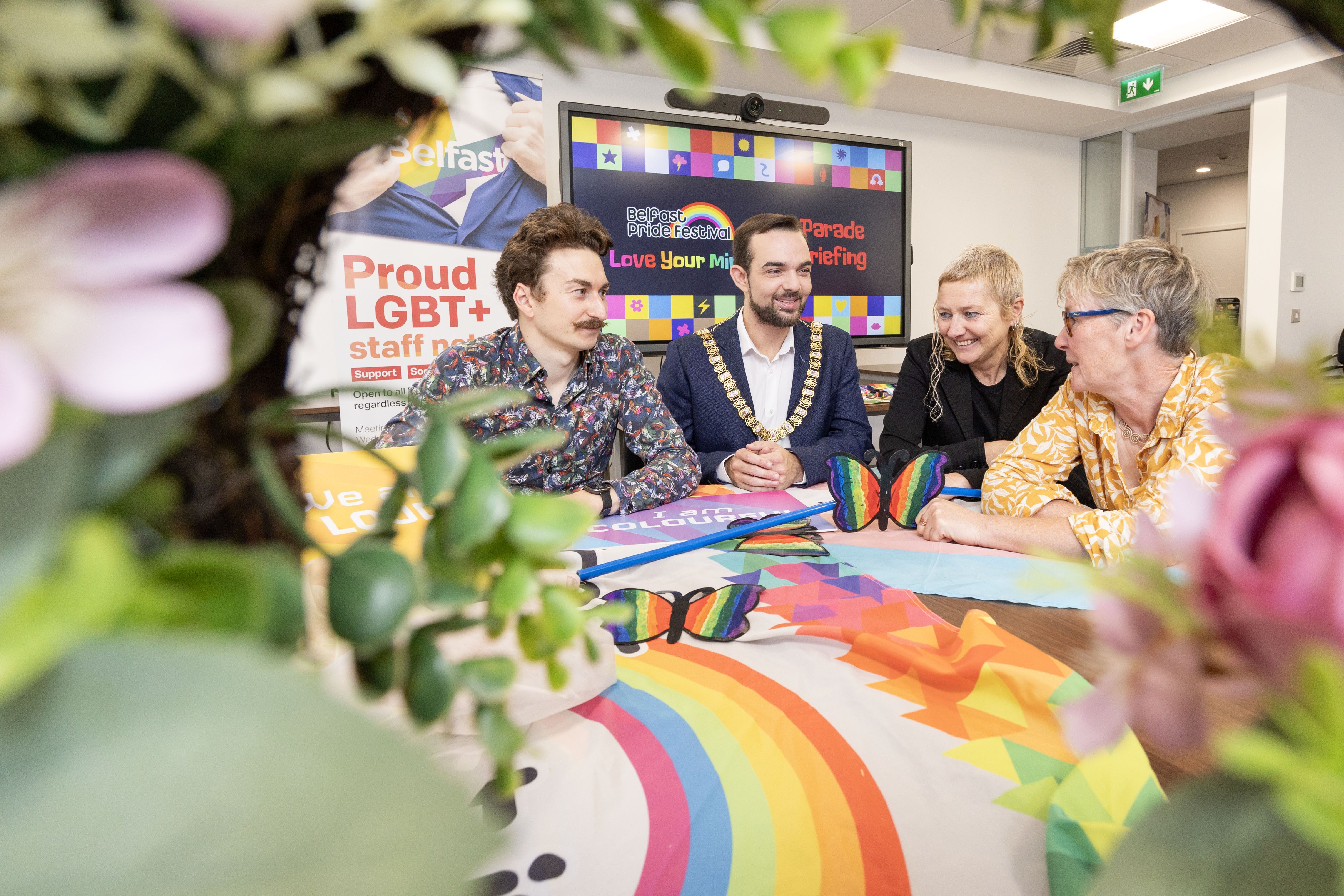 PRIDE PREPARATIONS: Lord Mayor of Belfast, Councillor Micky Murray, joins members of Belfast City Council’s Proud staff network to help with their final preparations for Saturday’s Pride parade