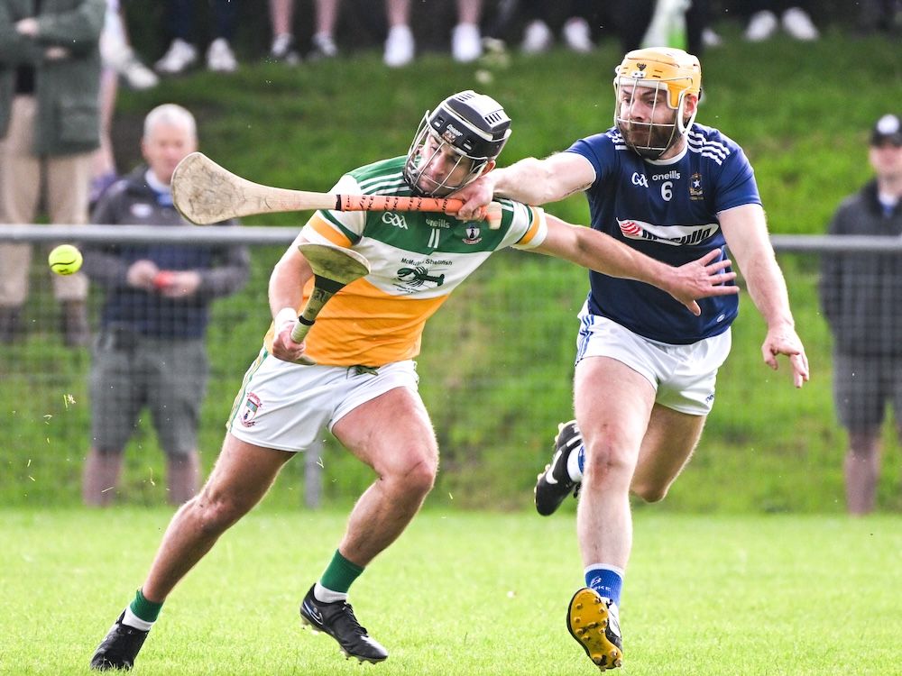 Tomás O\'Ciarán flicks the ball away from Alex O\'Boyle on Saturday 