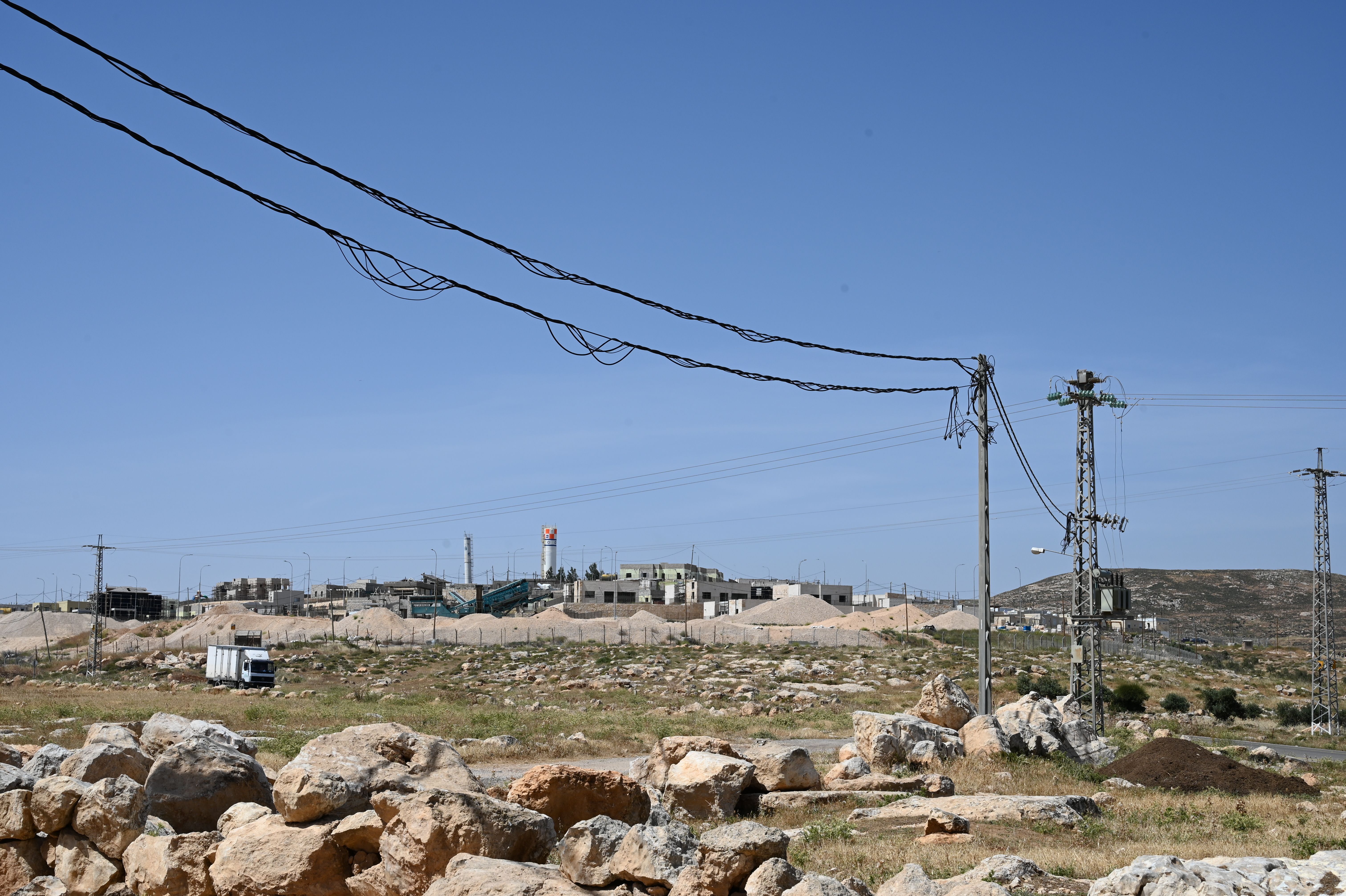 ENCROACHMENT: A settlement close to a Palestinian village