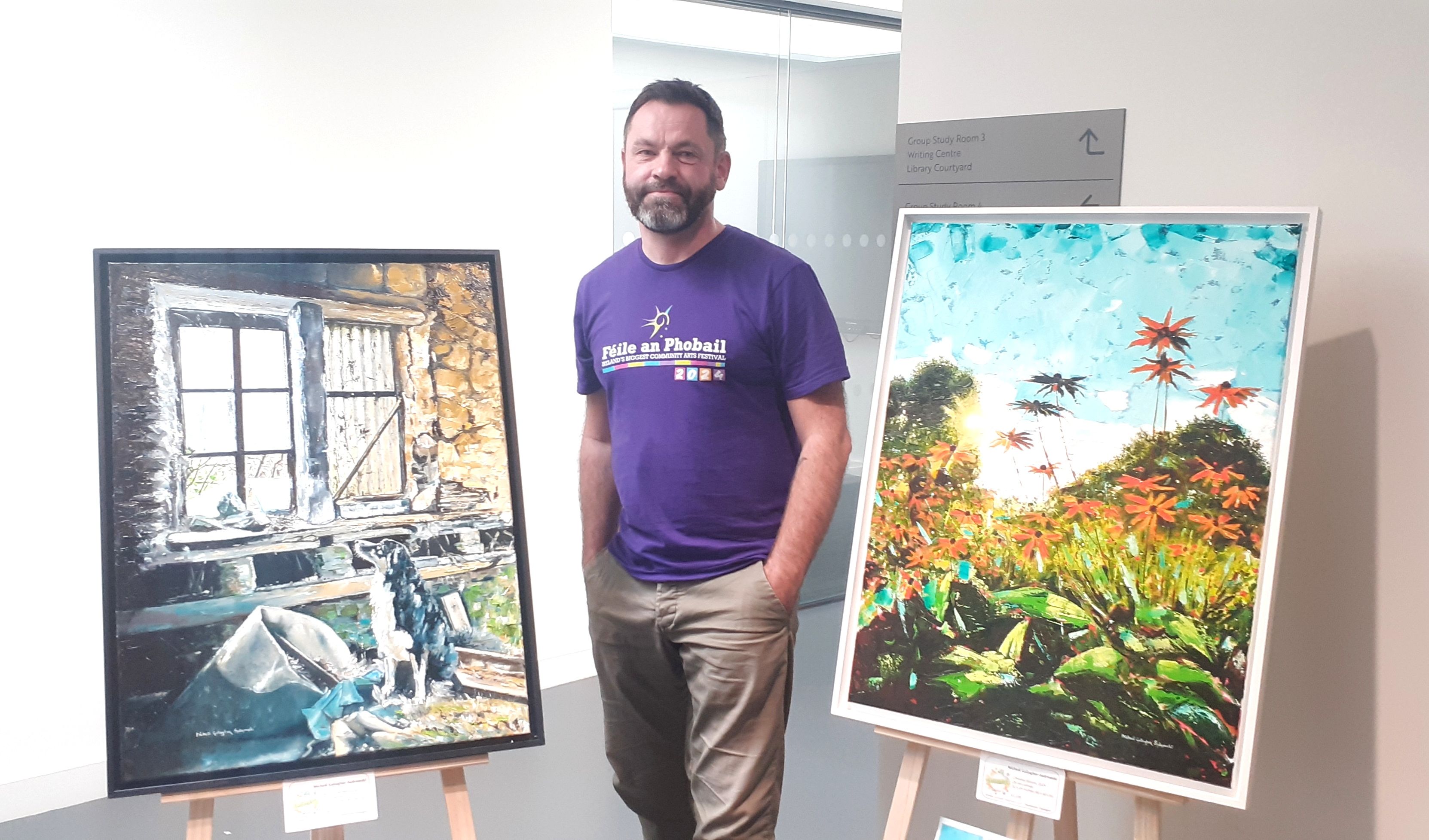 ARTS EXHIBITION: Mícheál Gallagher-Sedrowski with part of his 2024 Féile exhibition