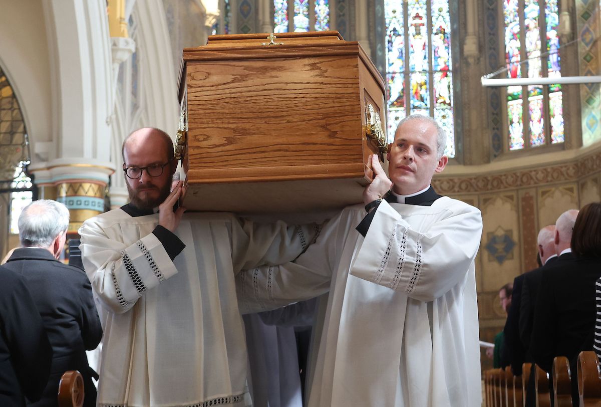 FINAL JOURNEY: Archbishop Noel Treanor\'s funeral mass at St Peter\'s Cathedral on Tuesday