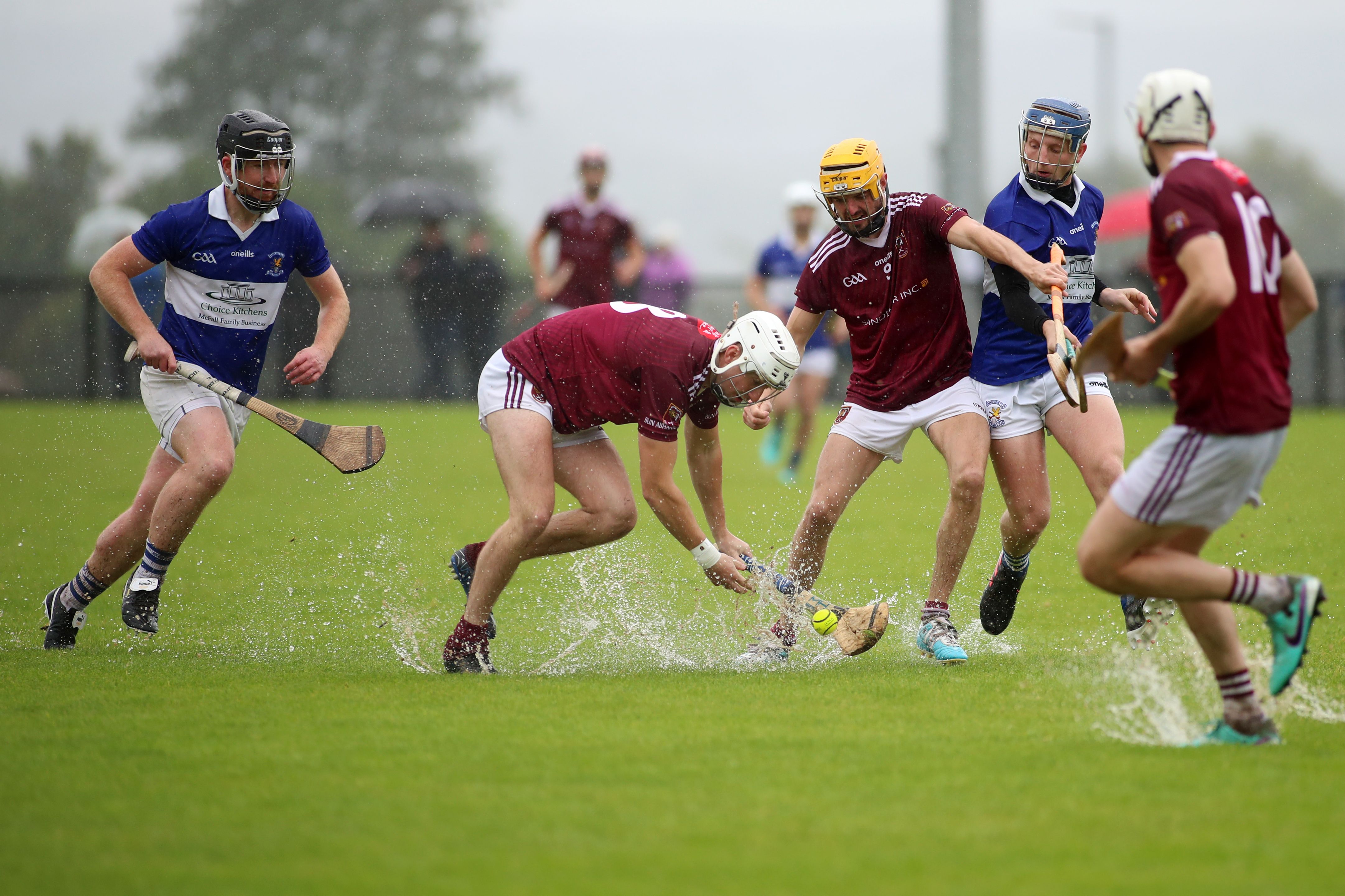 Fred McCurry attempts to dip the ball through a puddle on Sunday 