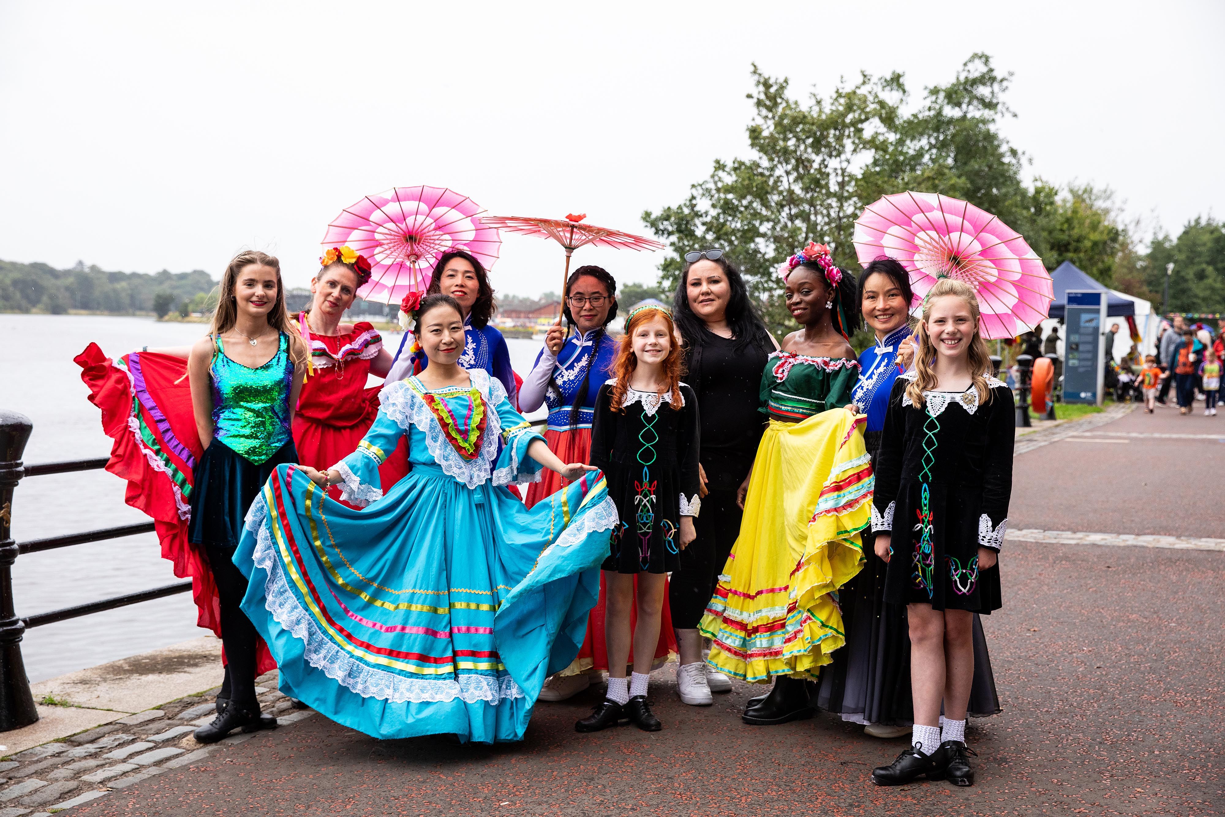 RIVER FESTIVAL: Housing Executive Good Relations Officer Lisa Hull with some of the artists at Féile na hAbhann