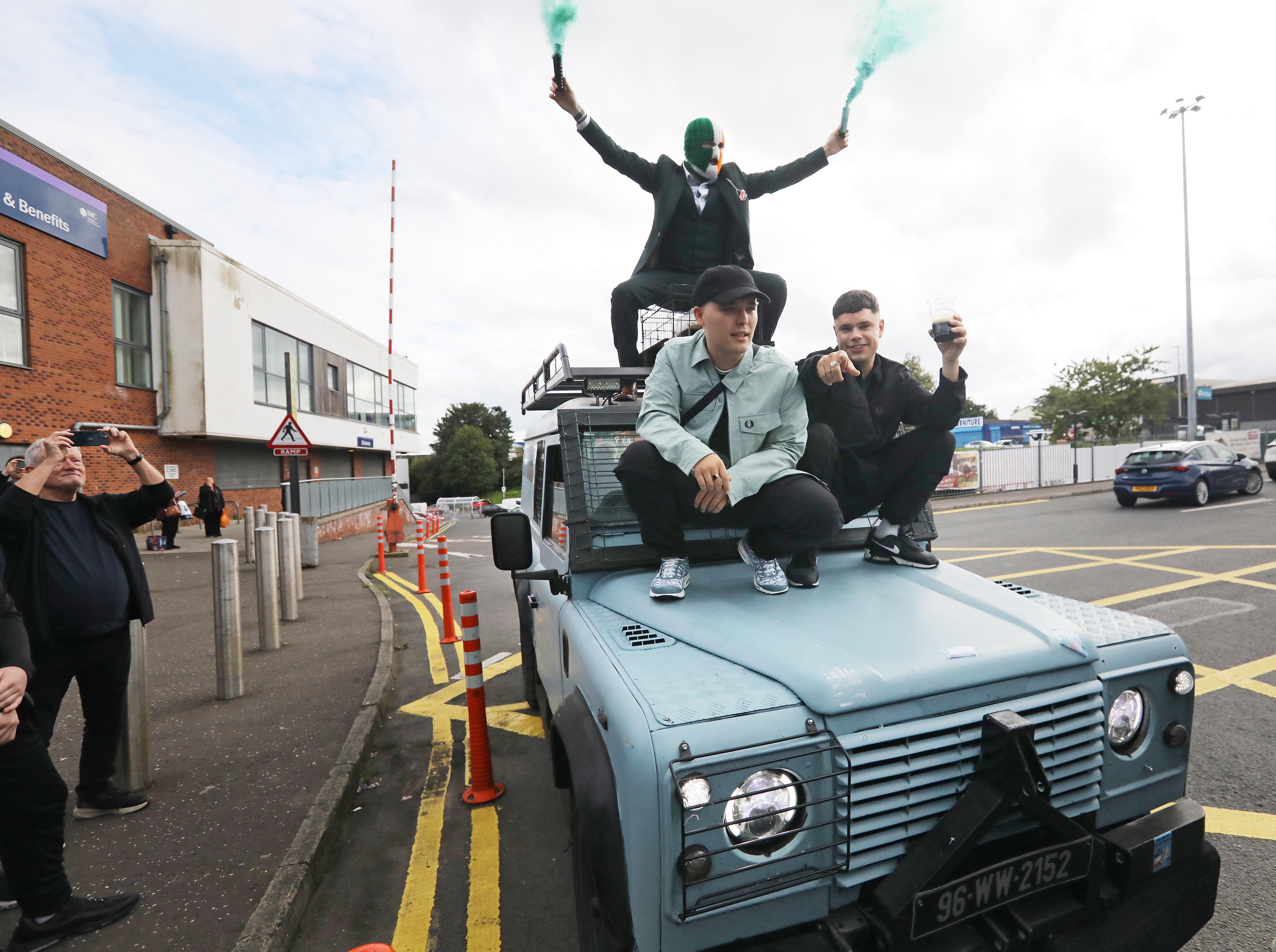 DRAMATIC ENTRANCE: Kneecap arriving at the Kennedy Centre for the movie\'s West Belfast premiere