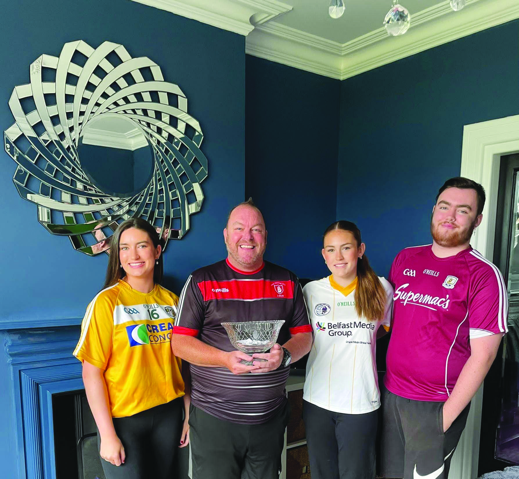 Ella Wilson, Micky McCloskey, Lisa Wilson and Luke Wilson make the draw for the tournament