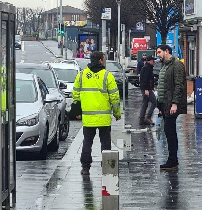 CONCERNS: Cllr Doherty talking to Department for Infrastructure staff during testing earlier this year