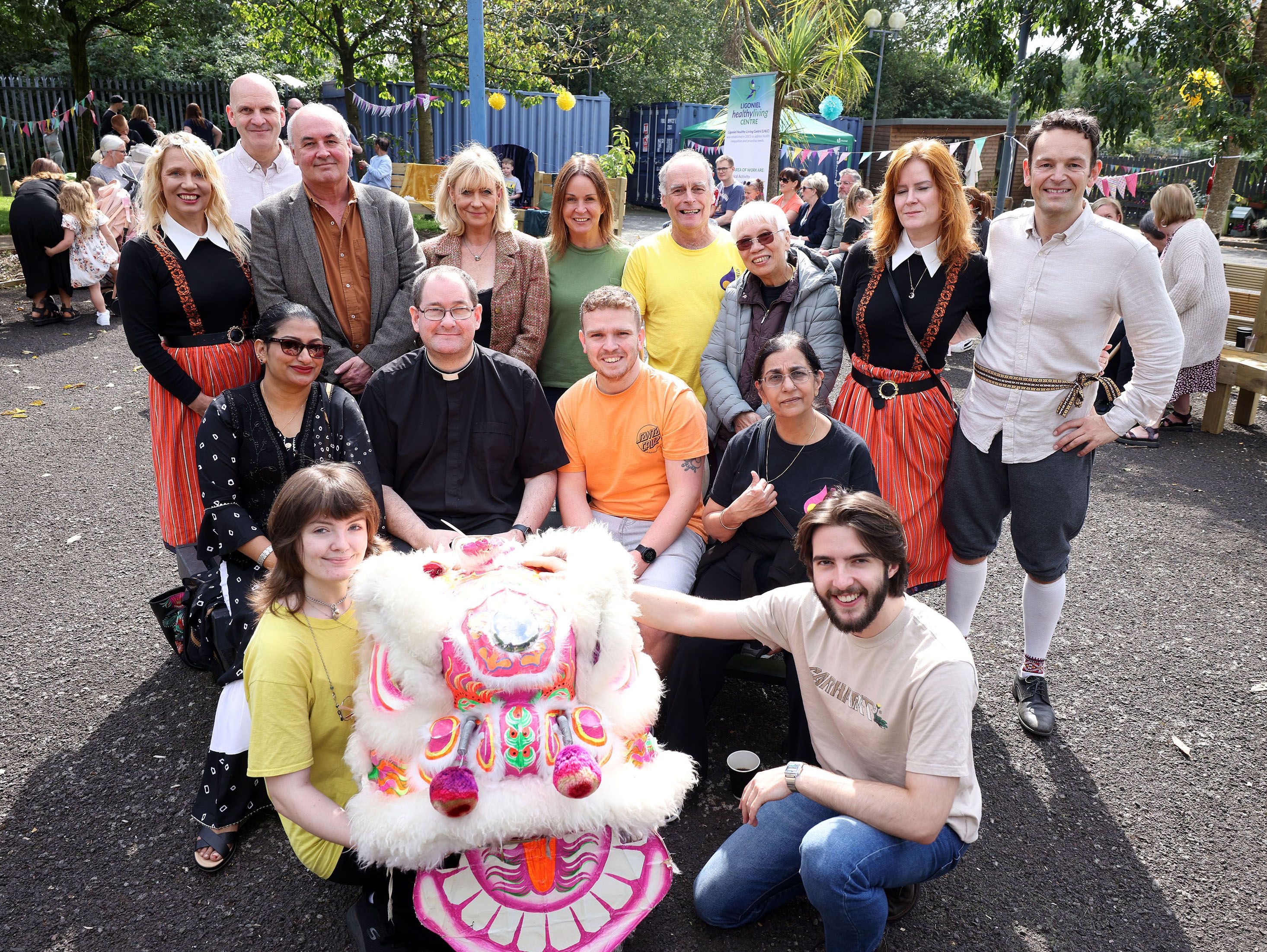 COLOURFUL DISPLAY: Performers and spectators at a multi-cultural festival at Wolfhill Centre