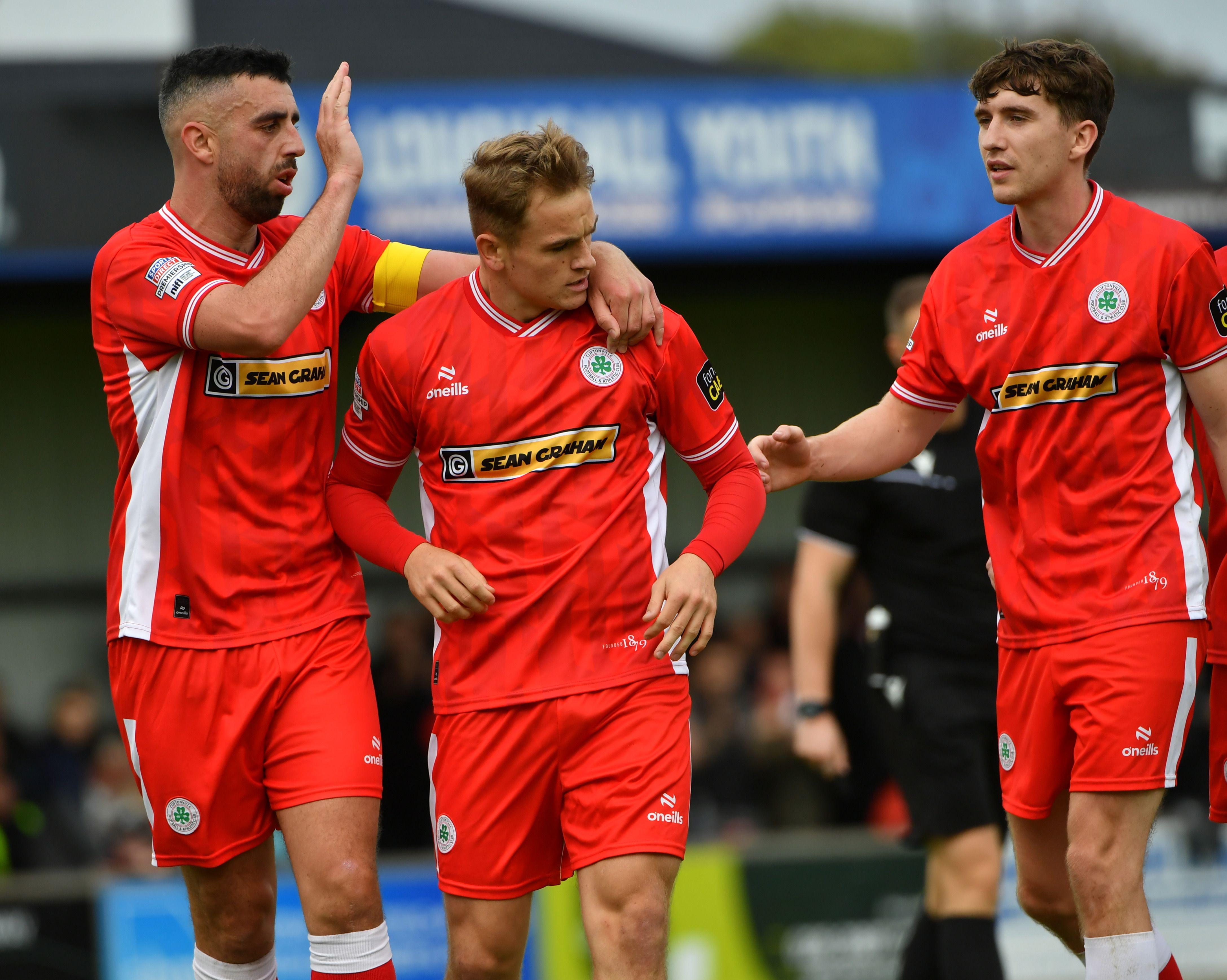 Taylor Patrick Steven is congratulated by teammates Joe Gormley and Micheal Glynn after he scored his side\'s fourth goal 