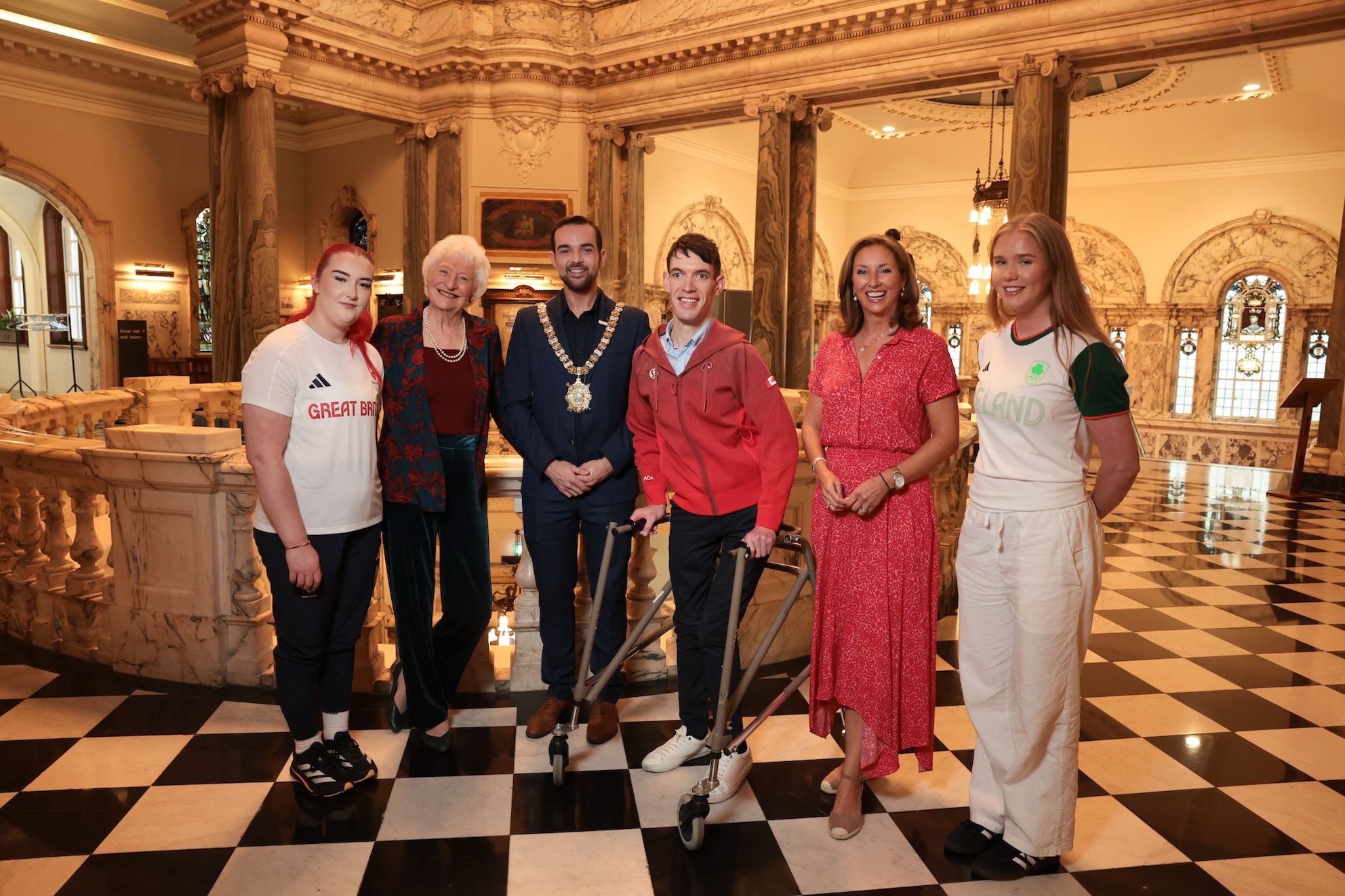 Paralympians Katie Morrow (wheelchair basketball) and Austen Burns (equestrian) and Olympian Erin Creighton (track cycling – team pursuit) join Lady Mary Peters, Lord Mayor of Belfast, Councillor Micky Murray, and broadcaster Claire McCollum