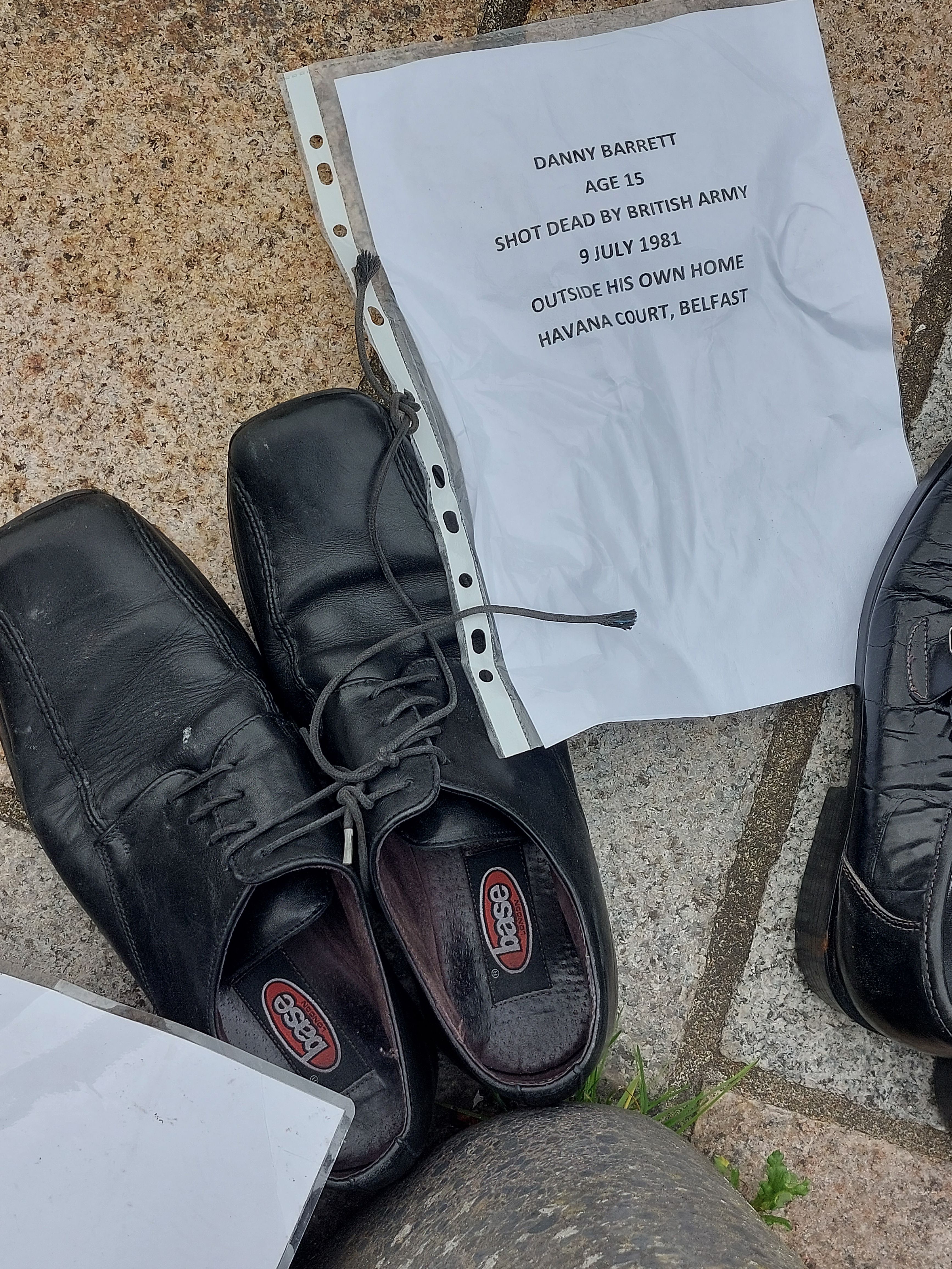 POIGNANT: During today\'s protest outside the law courts in Belfast, the shoes of many victims of the conflict were laid out on the pavement