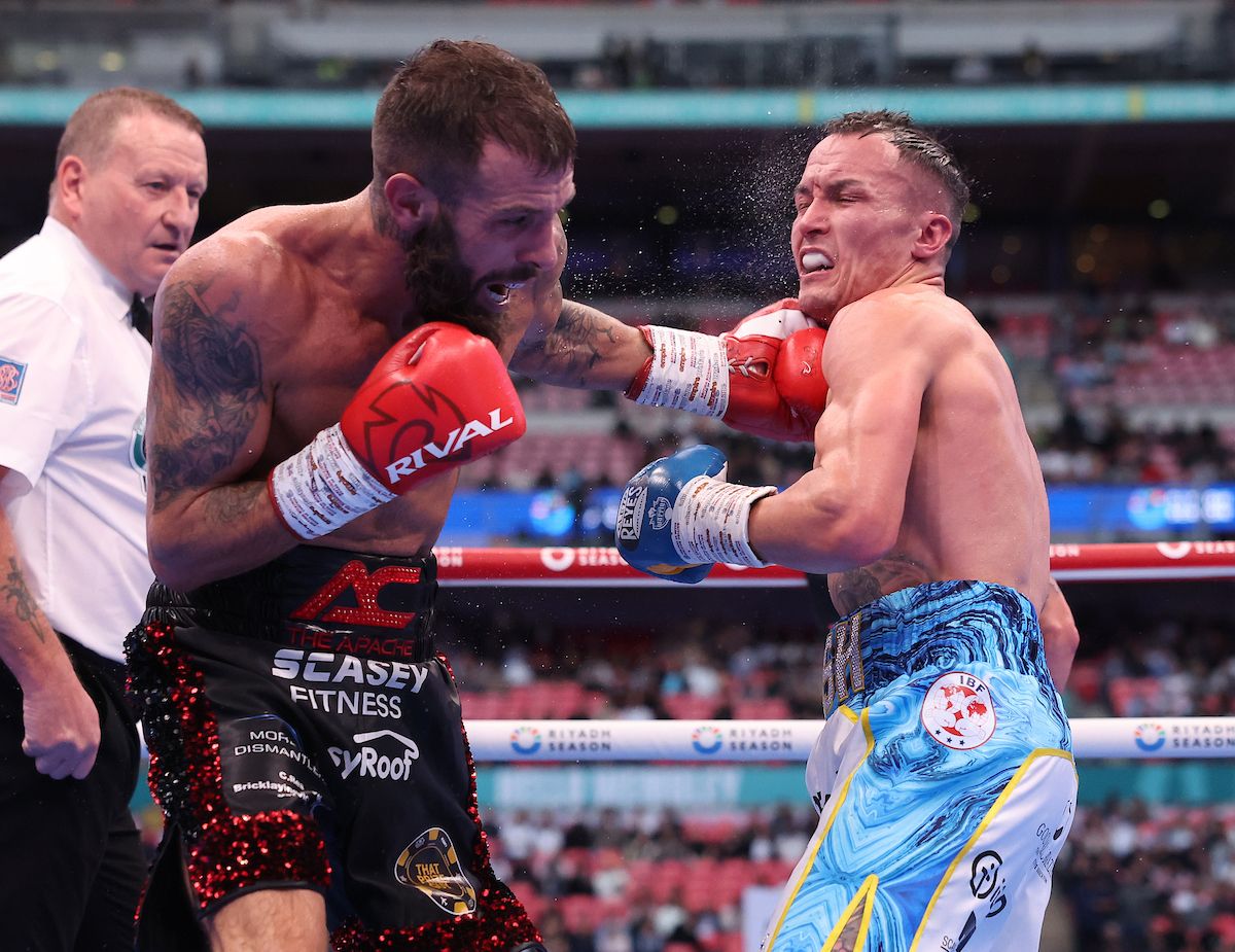 Anthony Cacace lands a left on Josh Warrington on Saturday