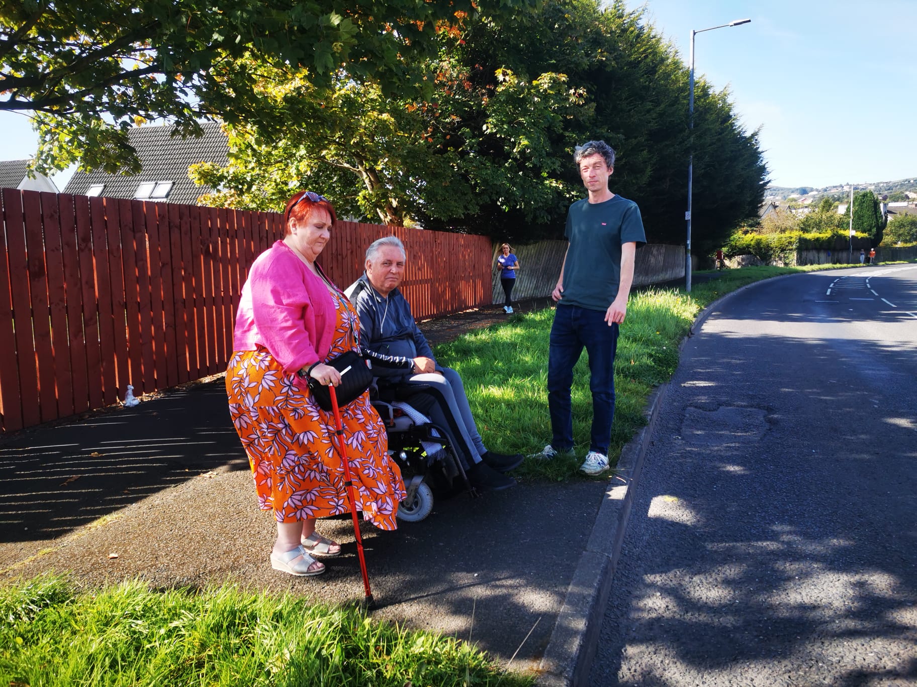 WHEELCHAIR ACCESS: Councillor Michael Collins with Maire Scott (Lagmore Community Forum) and disability rights campaigner Michael Bailey