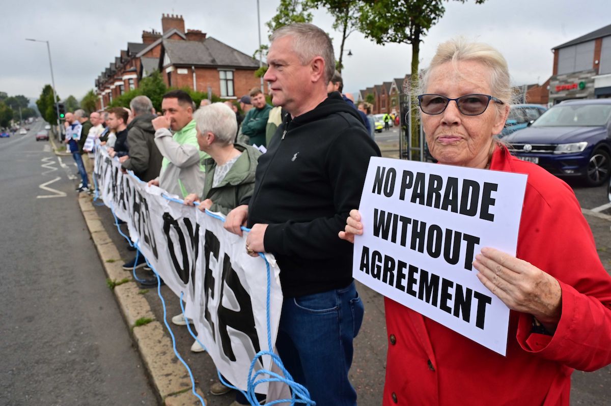 NOT WANTED: Residents held a protest as the Orange Order parade went by on Saturday