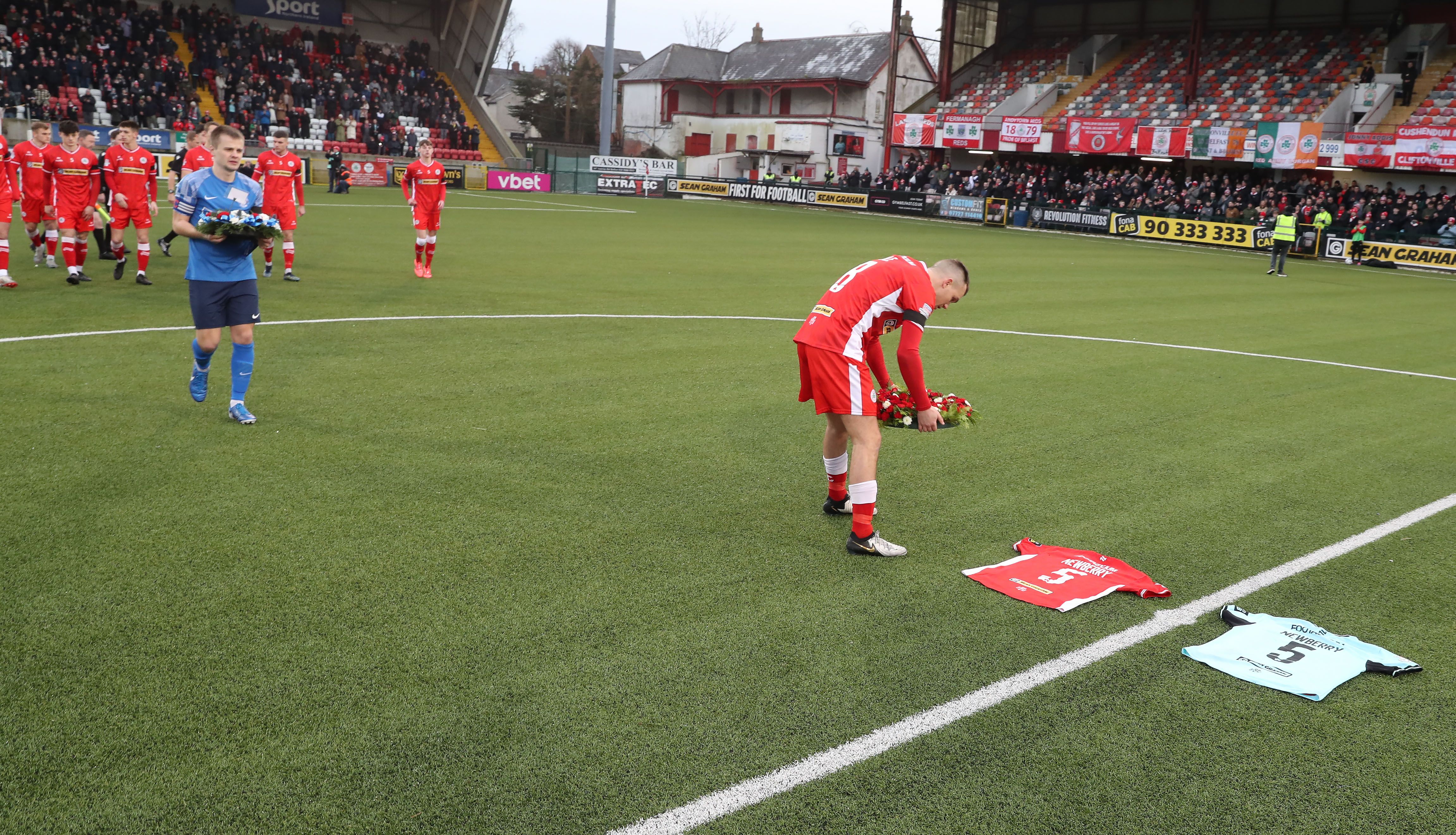 Rory Hale lays a wreath for Michael Newberry ahead of Saturday\'s Irish Cup game against Banbridge Rangers 