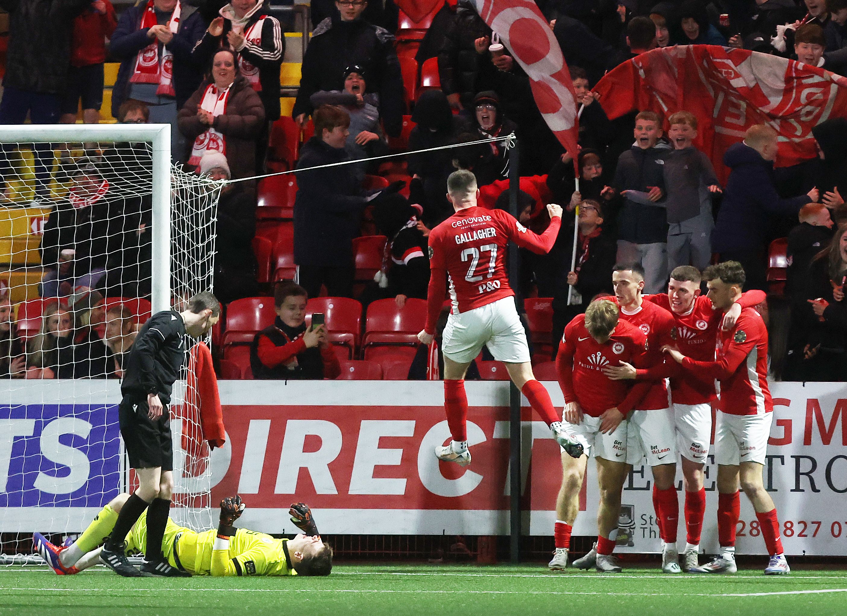  Dylan Sloan celebrates scoring past Cliftonville’s goalkeeper Lewis Ridd to make it 2-0 on Friday 