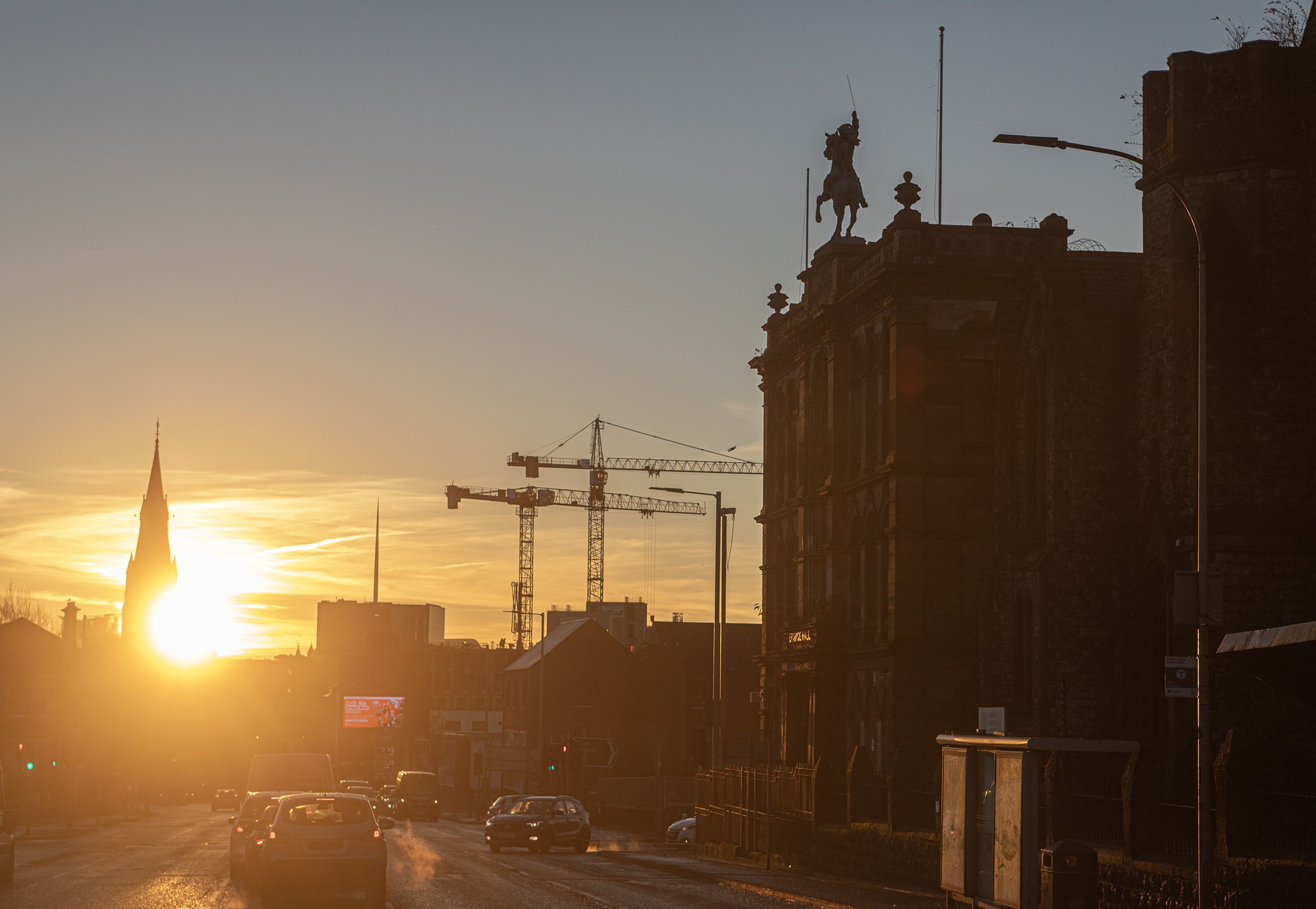 The sun rises over Belfast as seen from Carlisle Circus this morning