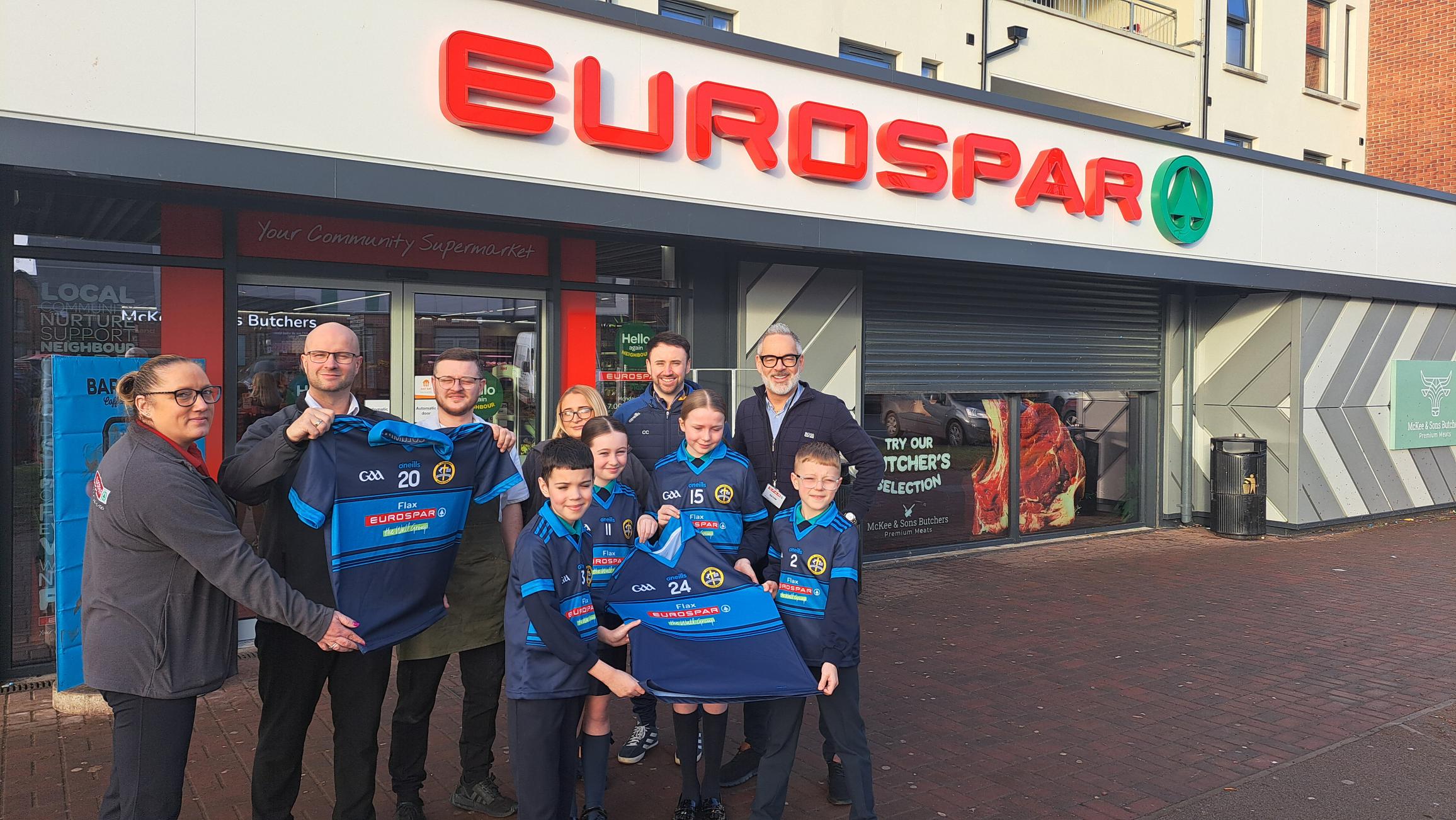 NEW KIT: Pupils from St Columban\'s Primary School with Gavan Wall at EuroSpar in Flax Street