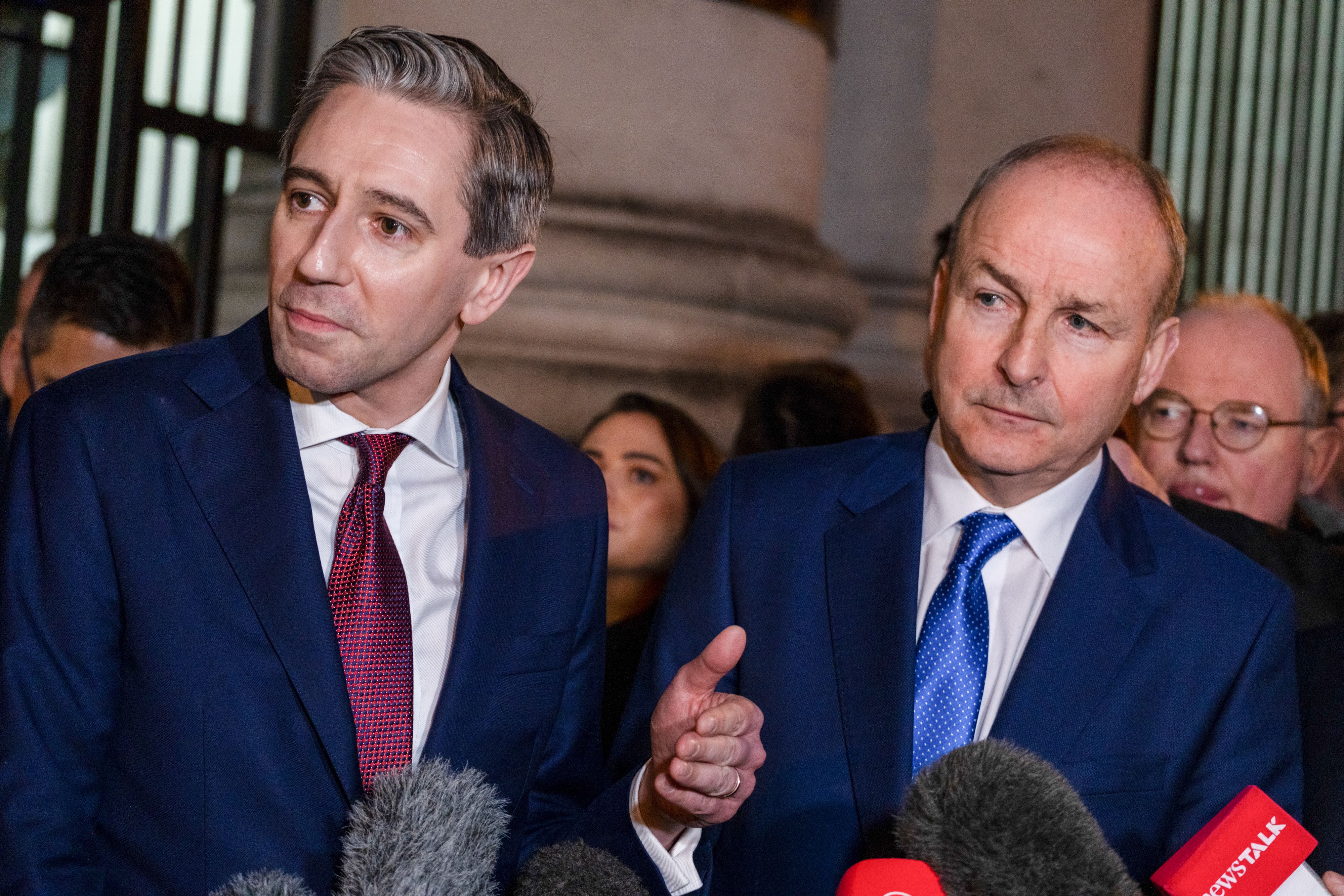 NOT A GOOD START: Fianna Fáil leader Micheal Martin and Fine Gael leader Simon Harris outside Government Buildings on Wednesday evening after the Dáil was adjourned amidst controversy over speaking time in the chamber