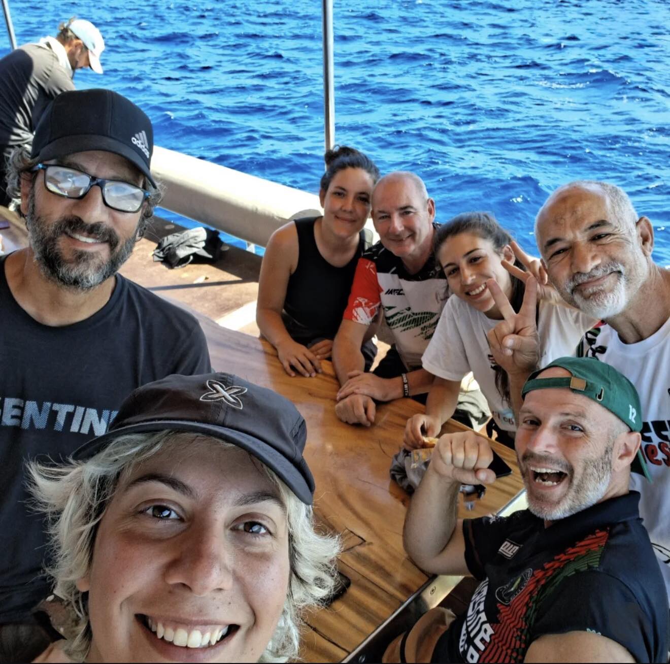 SUPPORT: Fra Hughe, centre, with Palestinian activists on the flotilla