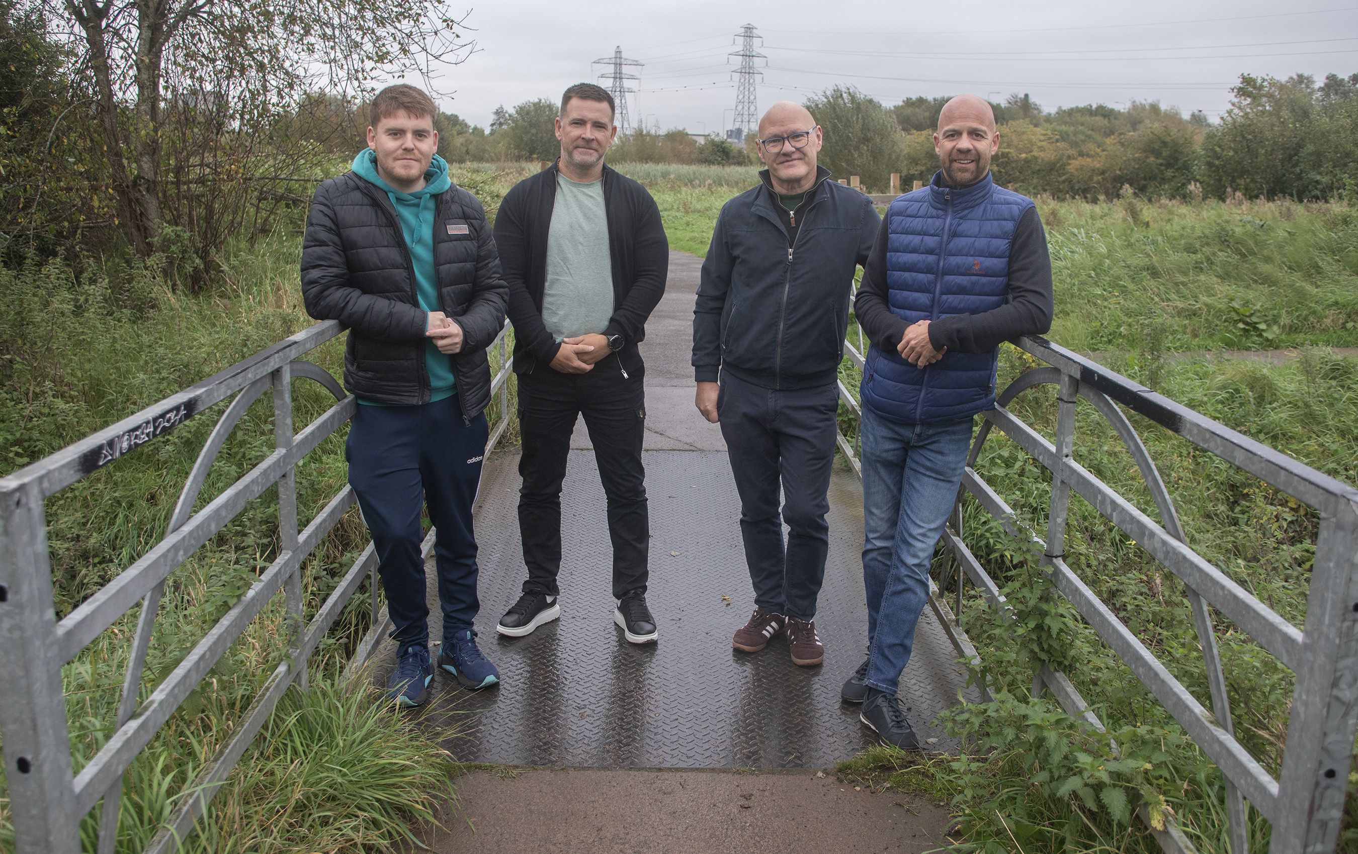 ON THEIR BIKES: Councillor Ronan McLaughlin, Terry Quinn (Strategic Health and Wellbeing Coordinator, West Belfast Partnership Board), Paul Maskey MP and Joe Duffy (Strategic Development Co-Ordinator, West Belfast Partnership Board)