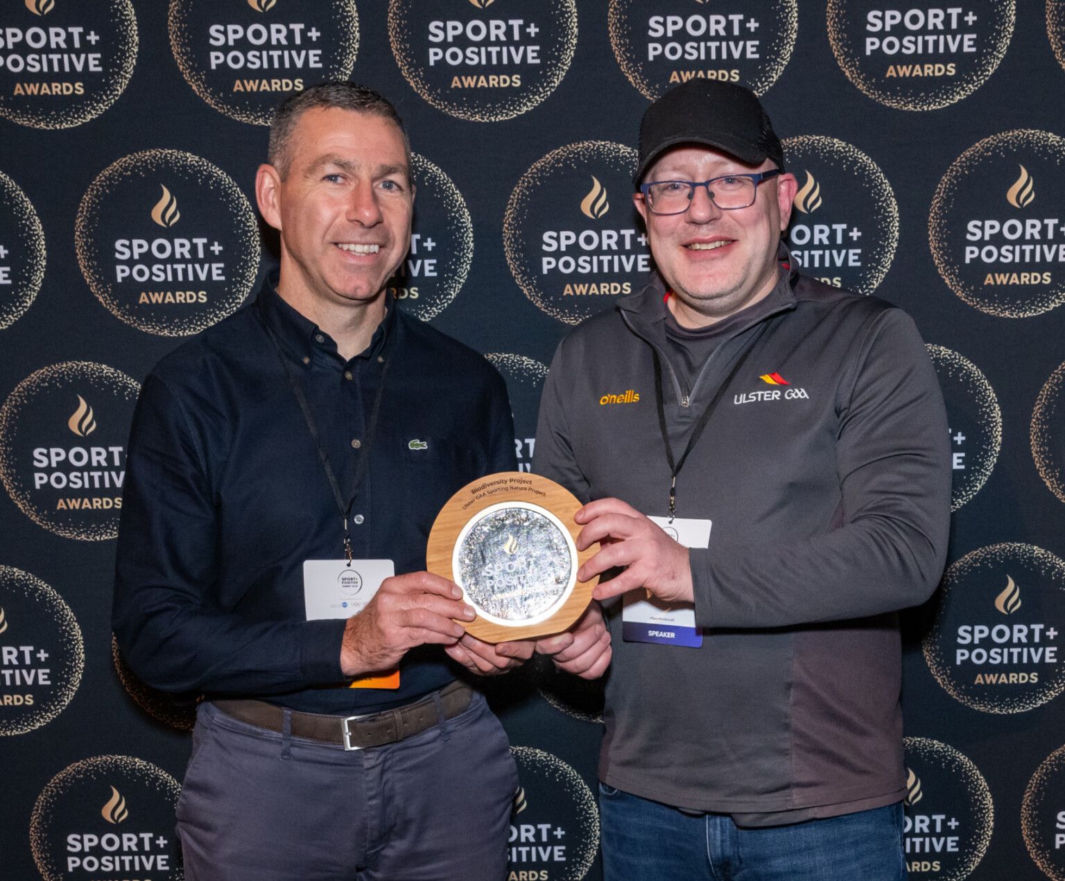 WELL DESERVED: Tim McCann (right) acepts his Sport Positive award at a glittering ceremony in London