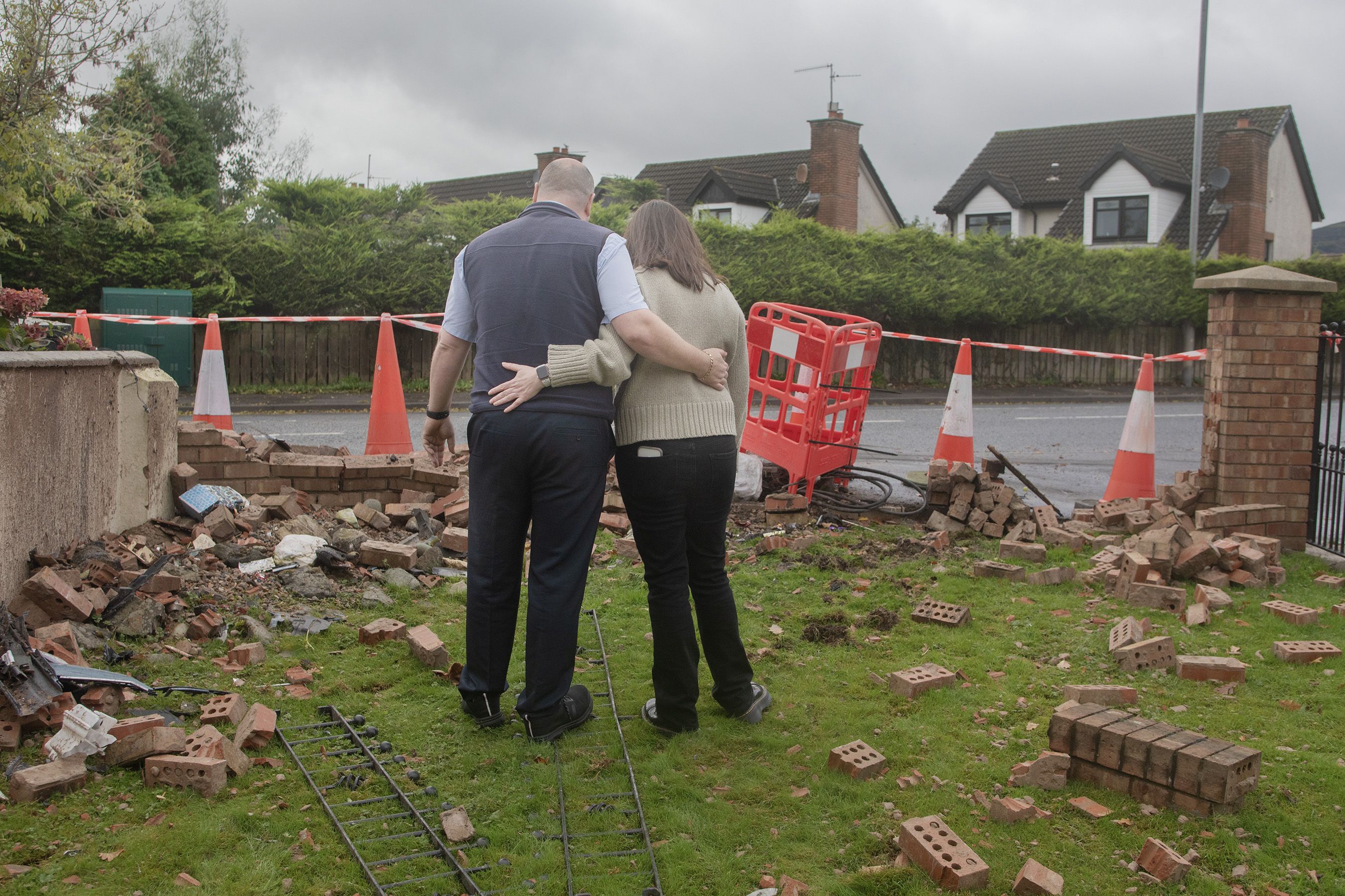 ASSESSING THE DAMAGE: Jaclyn and Chris O\'Neill in the garden of their Blacks Road home