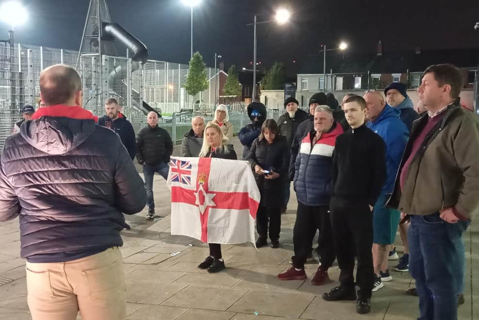 NOW YOU SEE THEM: Cllr Ron McDowell addresses the small crowd of protesters at Olympia Leisure Centre