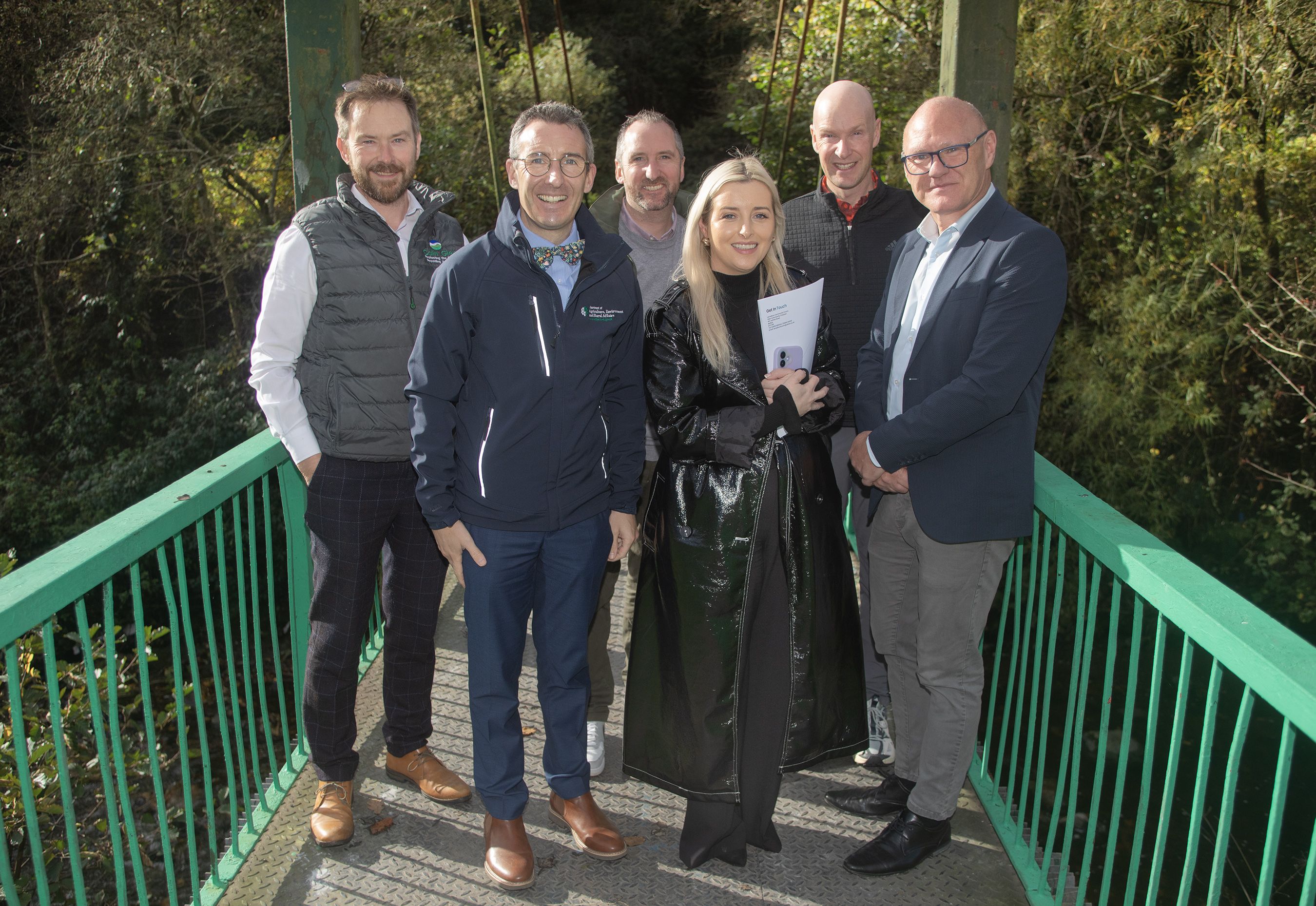VISIT: DEARA Minister Andrew Muir, second left, during his visit to Colin Glen