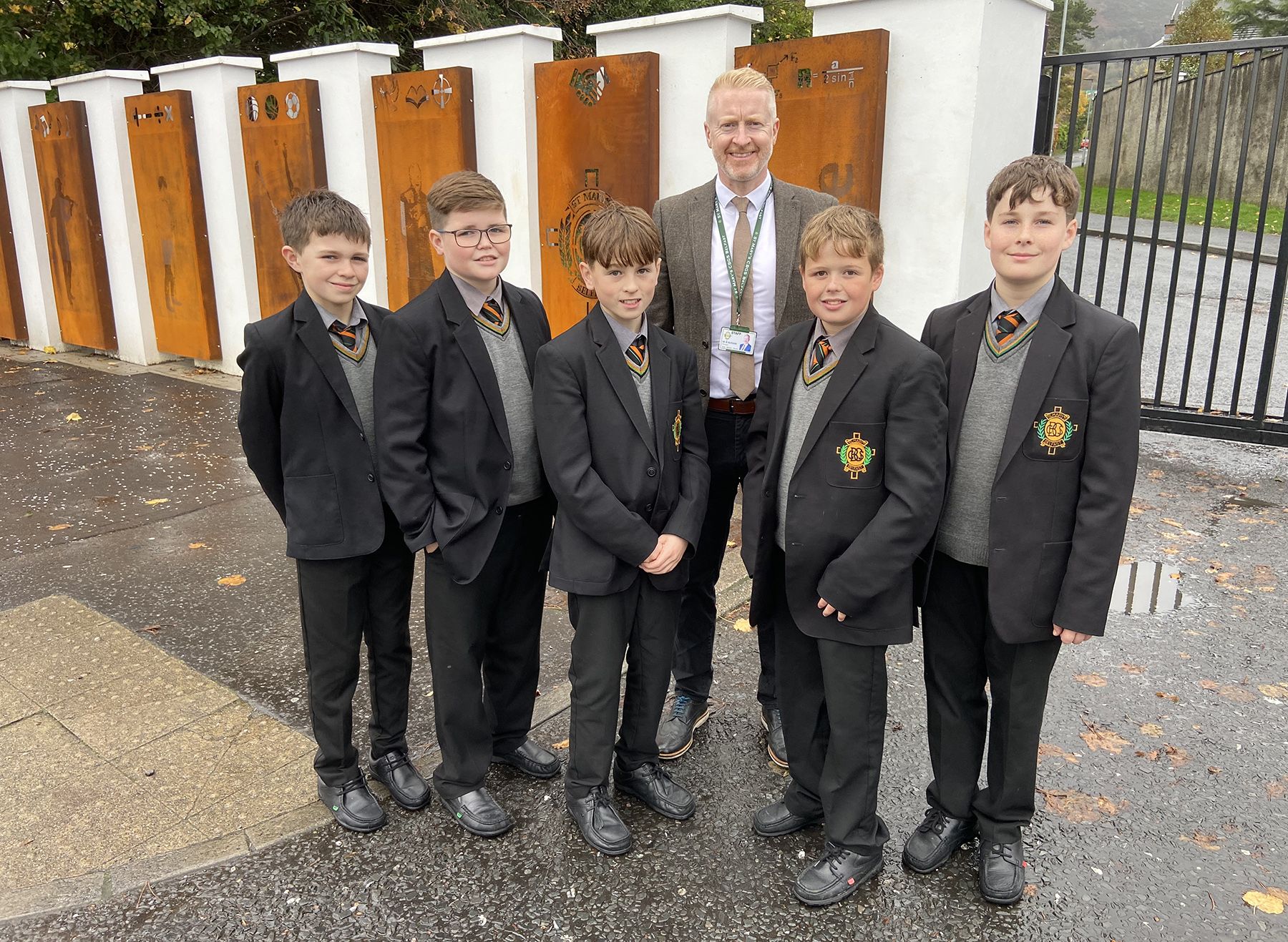 NEW LOOK: St Mary\'s Principal Brendan McComb with pupils at the new panels at the front of the school