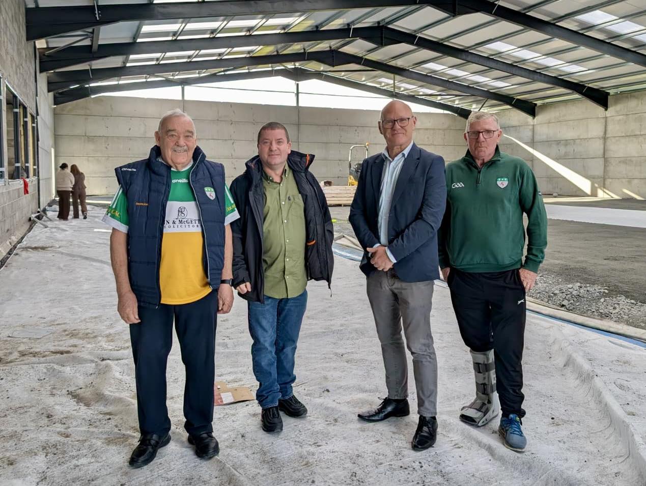 VISIT: Cllr Ciarán Beattie, Tommy Shaw, Paul Maskey MP and Liam O\'Neill inspecting the Beechmount facility