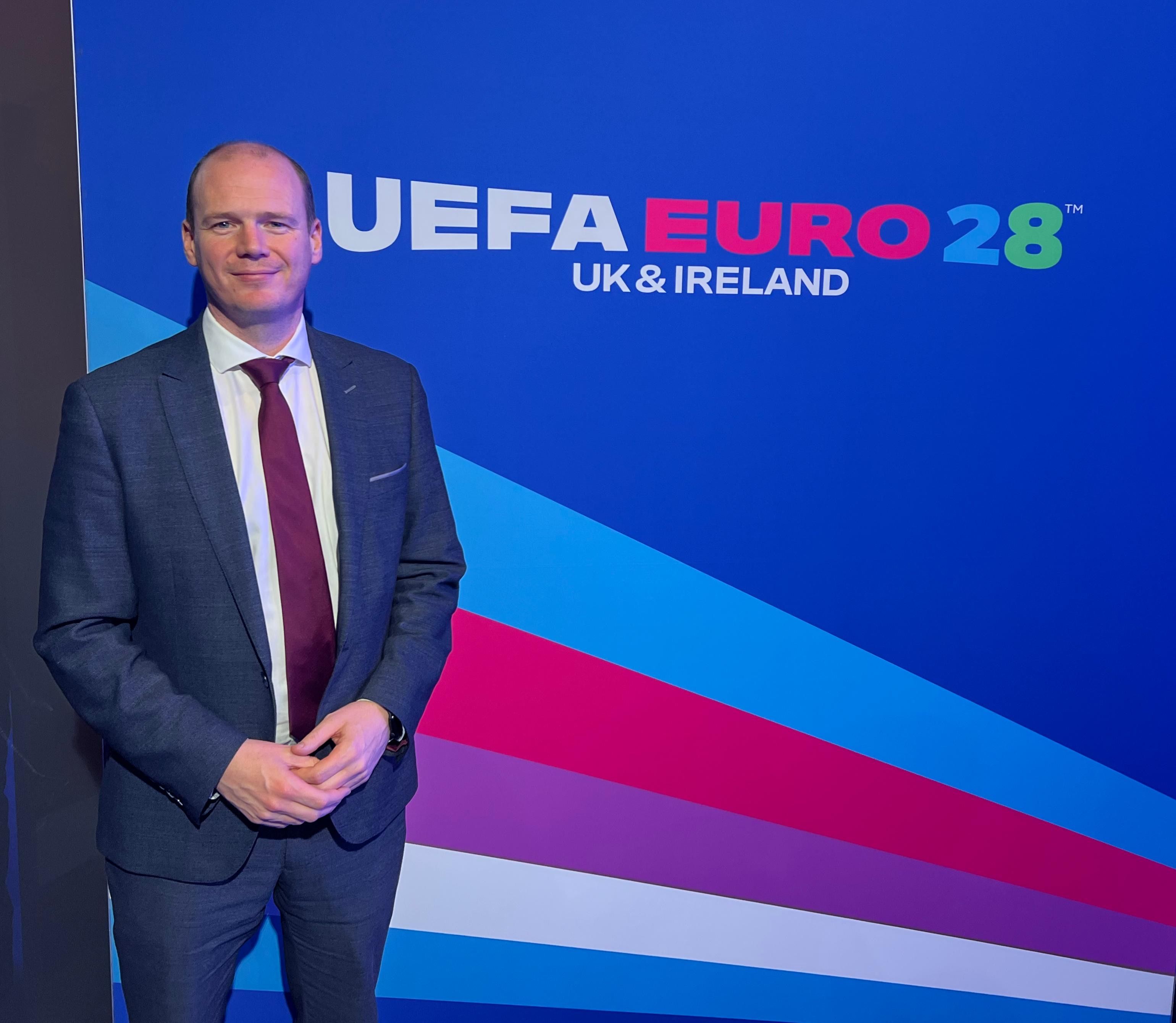 ANTI-CLIMAX: Communities Minister Gordon Lyons at the official launch of UEFA EURO 2028 in London