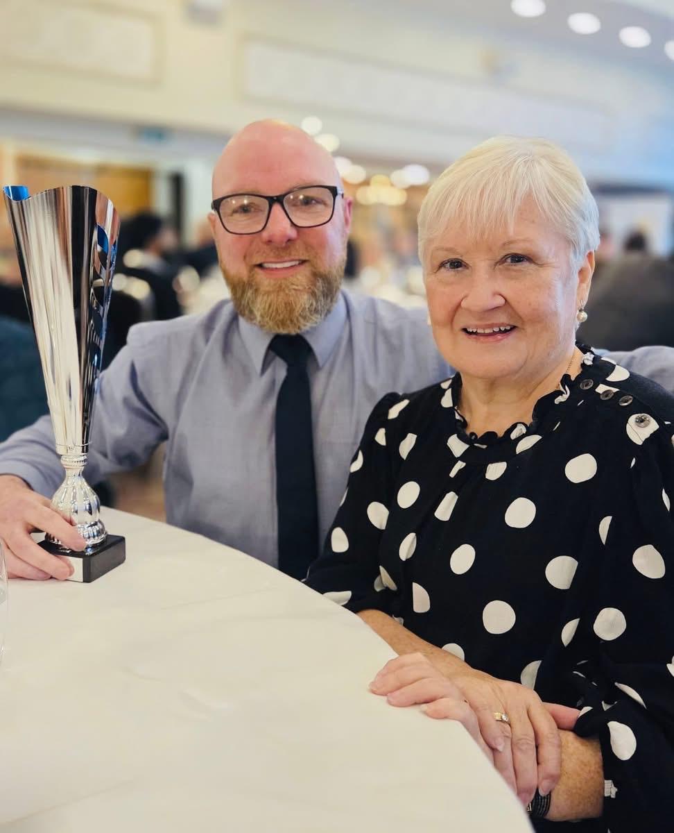DELIGHTED: SAG assistant manager Séamus Judge with Treasurer Anne Aldridge with the trophy