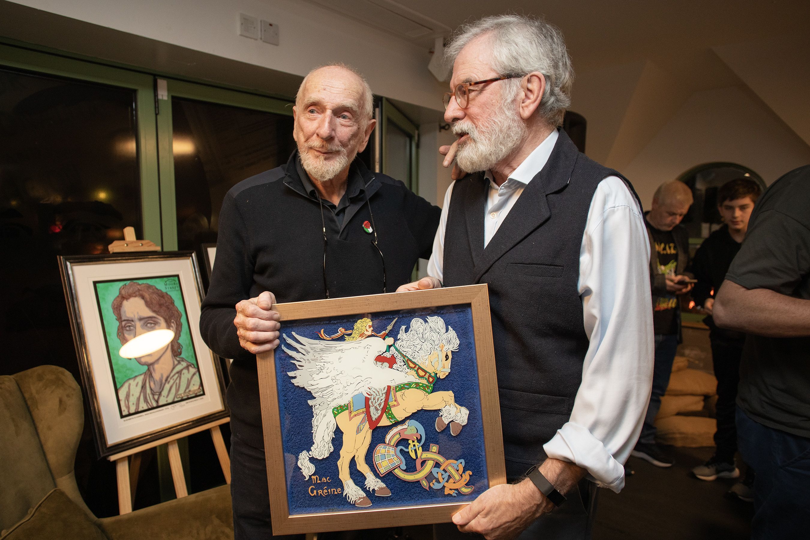 PRESENTATION: Gerry Adams interviewed Jim Fitzpatrick at the evening in Áras Uí Chonghaile