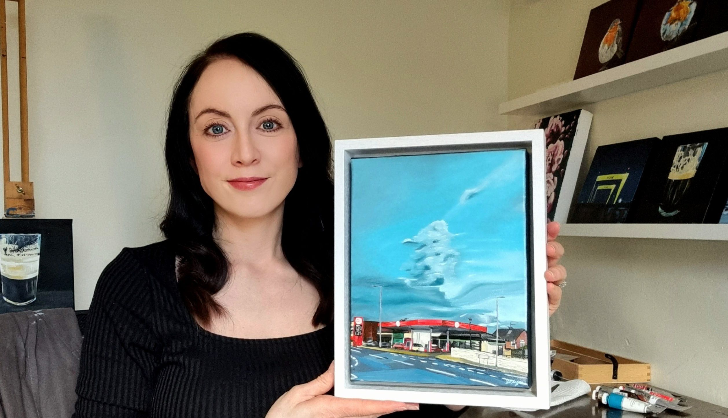 ACCOLADE: Artist Hannah O\'Hagan with her painting of the Go Garage