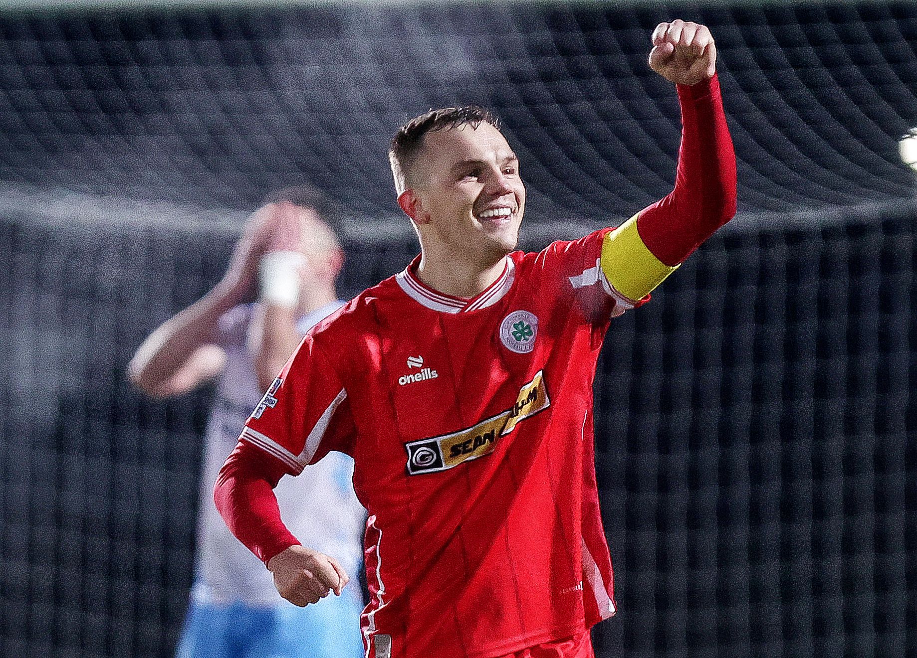 YOU REDS: Captain Rory Hale celebrates towards the Cliftonville faithful