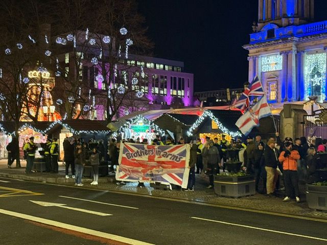 GATHERING: Loyalist protesting outside City Hall this evening next to the Christmas Market