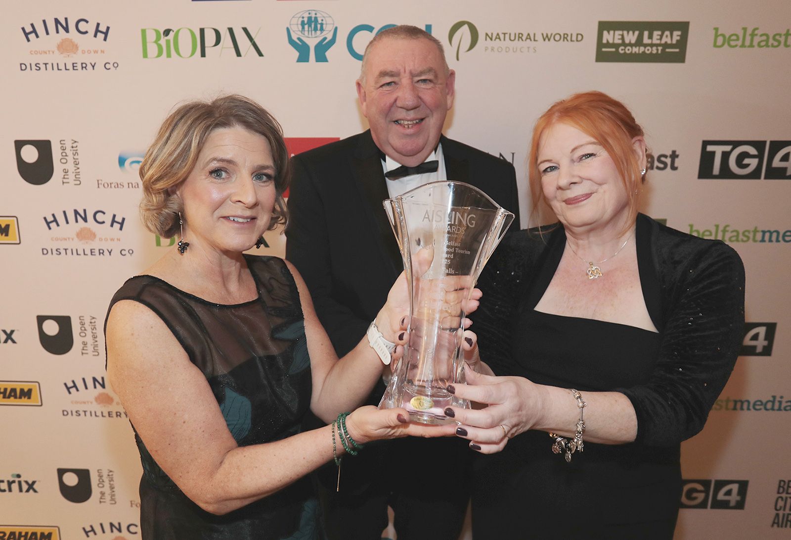 VISIT BELFAST TOURISM AWARD: Gerry McConville and Marie Maguire from winners 'The Falls- Where The Troubles Began at St Comgalls' with Mary Jo McCanny from sponsors Visit Belfast