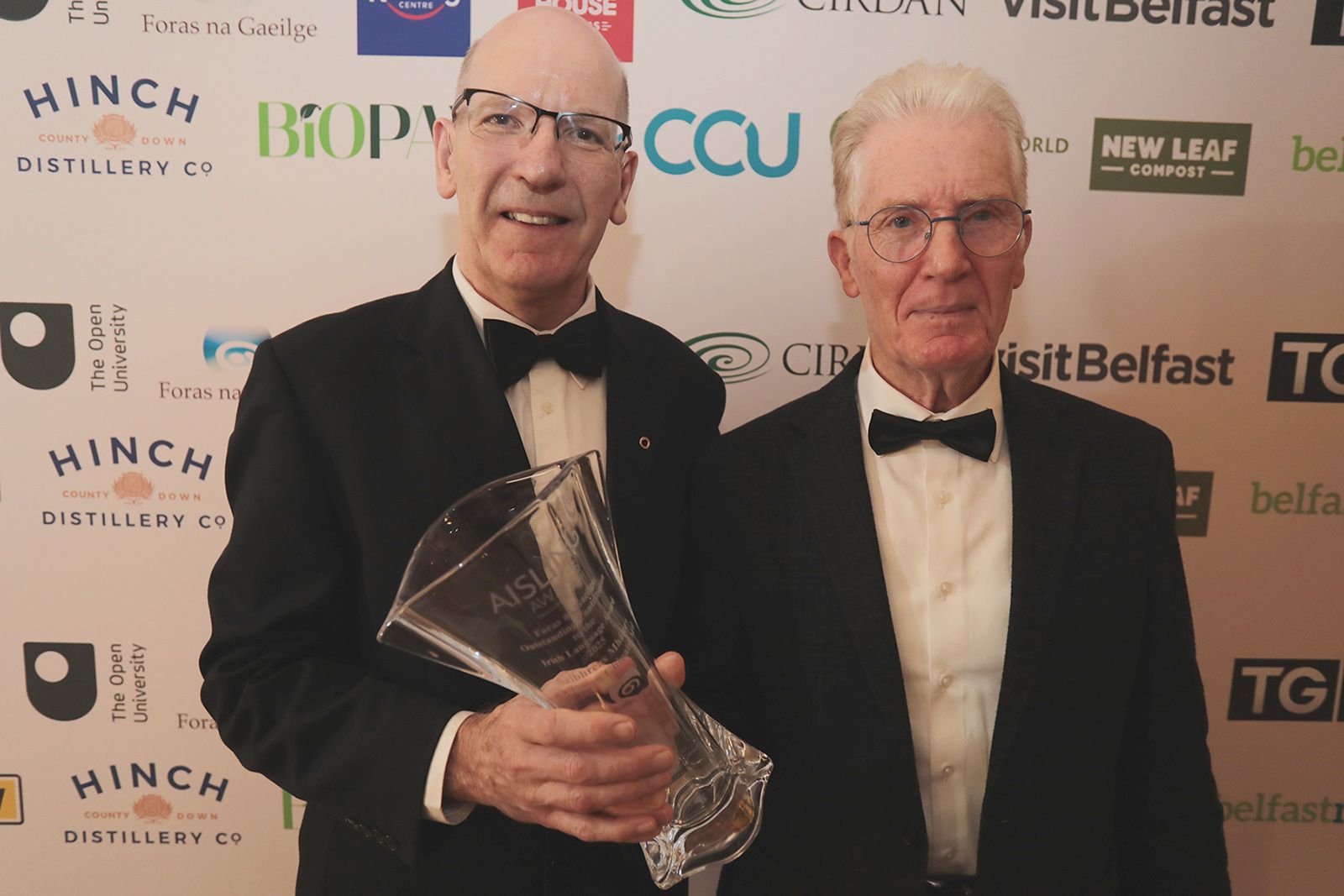 OUTSTANDING CONTRIBUTION TO IRISH LANGUAGE SPECIAL RECOGNITION AWARD: Dominic Garland (Saibhreas Mháire - Cumann Chluain Árd) with Seán Ó Coinn from sponsors Foras na Gaeilge