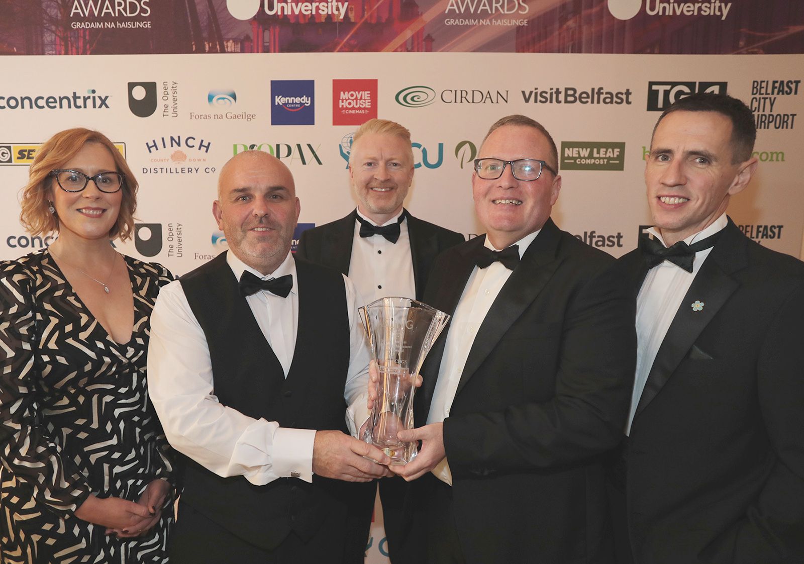 SPORT AWARD: Alfie Hannaway, Seamus McKenna, Brendan McComb and Amanda Barr from winners St Mary's CBGS with Brian Graham from sponsors Sean Graham