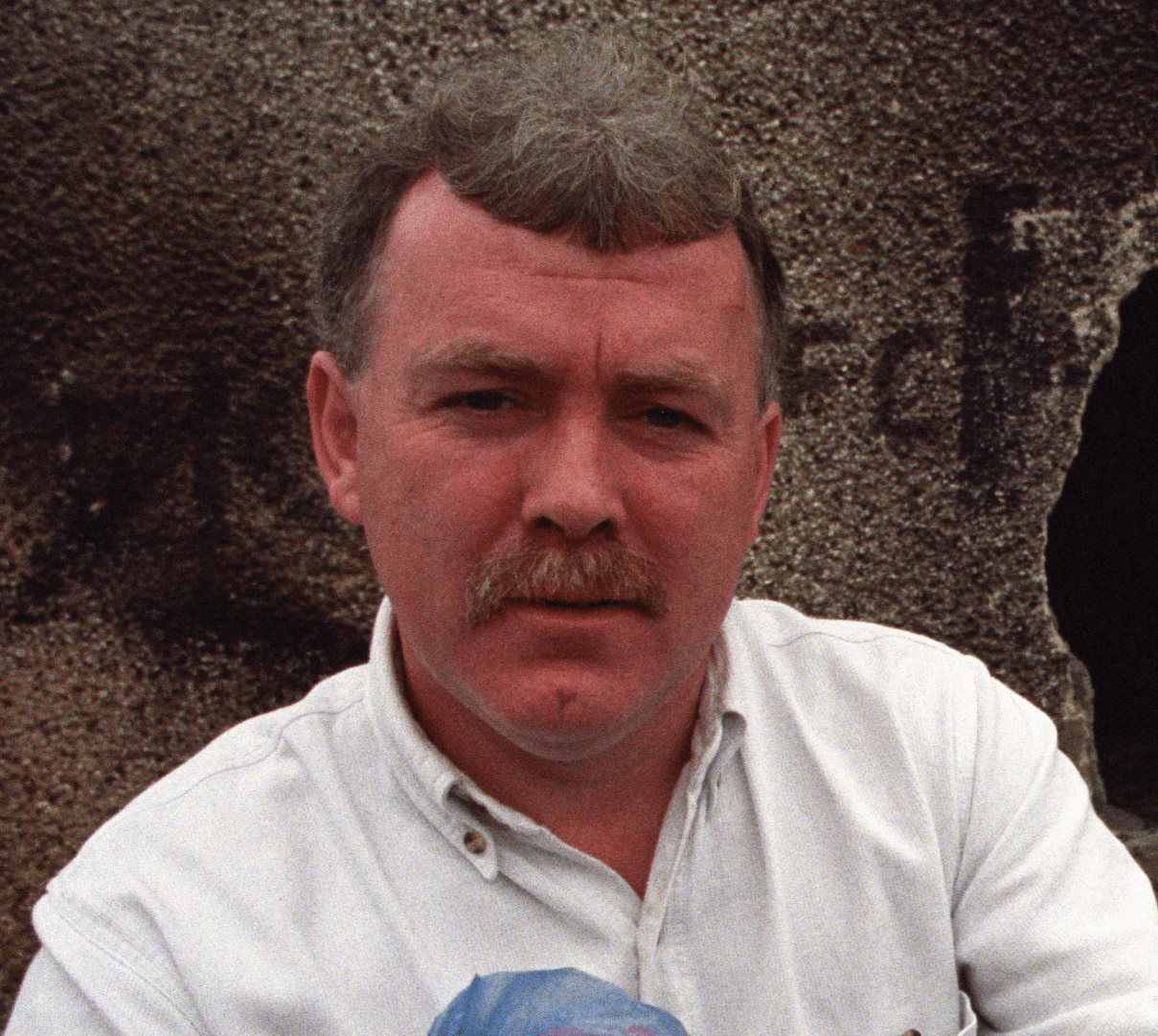 MOURNED: Ronnie McCartney in his role as a community activist in Beechmount back in 2007