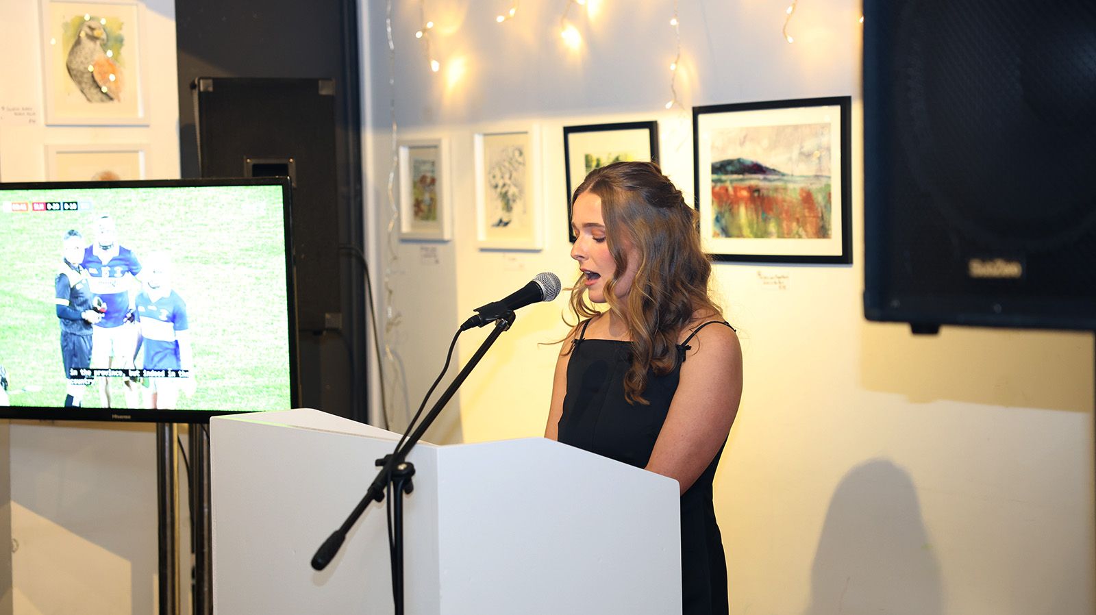 Laochra Loch Lao Community Outreach Officer Bríd Nig Aoidh speaking during the evening