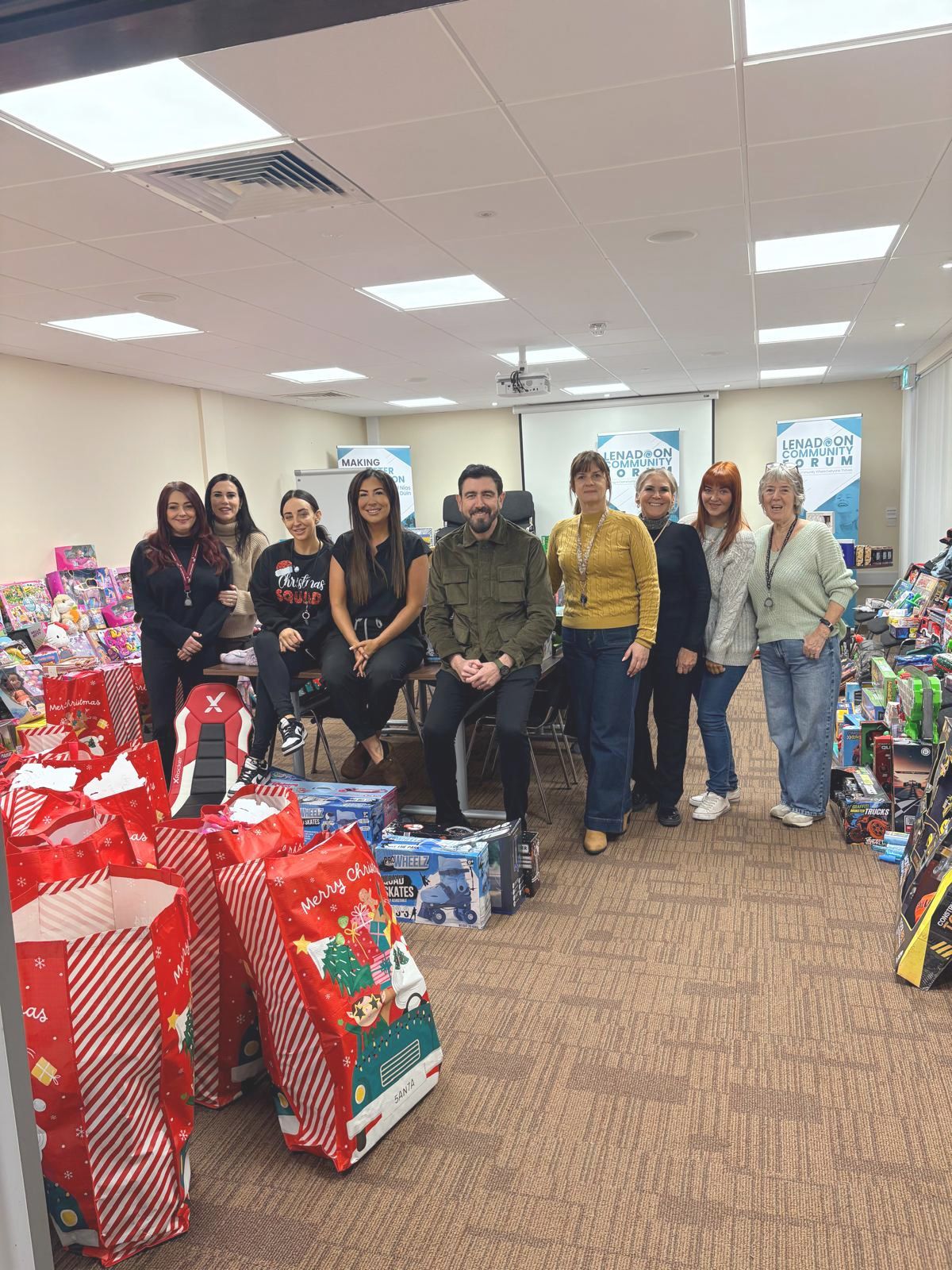 TOY APPEAL: Members of Lenadoon Women\'s Group with Deputy Lord Mayor Paul Doherty