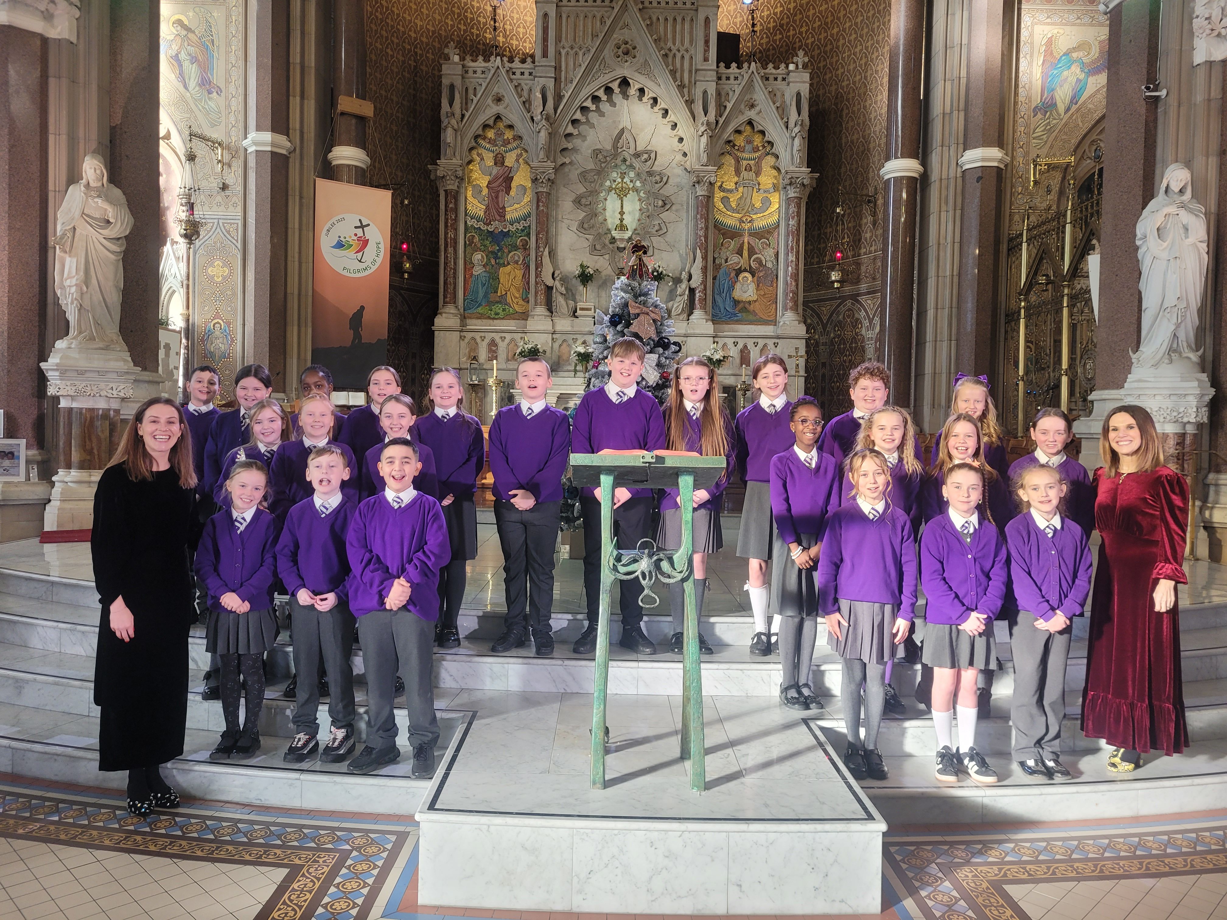 SPECIAL VENUE: St Clare\'s Primary School choir with their choir mistresses in Clonard Monastery